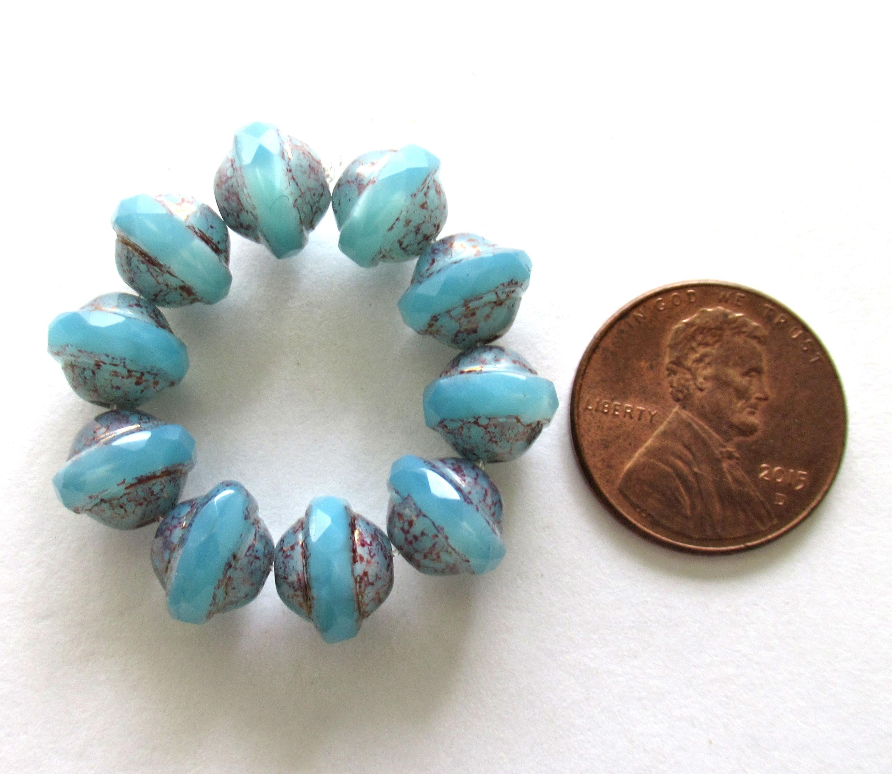 Ten Czech glass saturn or saucer beads - 8 x 10mm - translucent blue opal faceted beads with a splotchy purple picasso finish - C00661