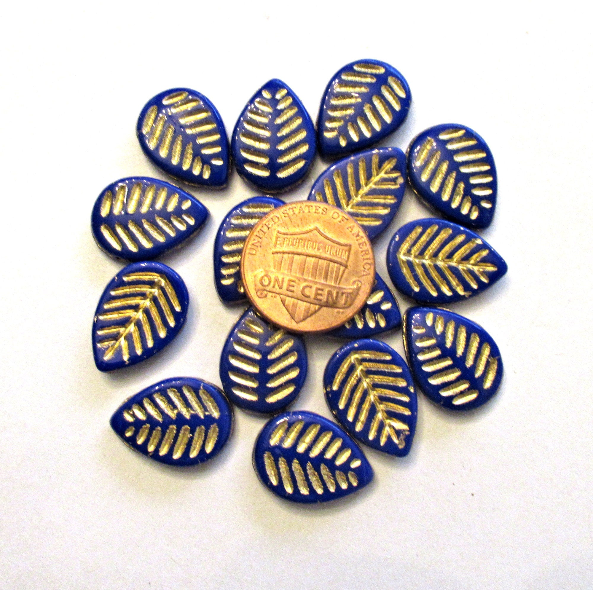 Ten large Czech glass leaf beads - side drilled - opaque royal blue beads with a gold wash - 12 x 16mm carved beads C00041