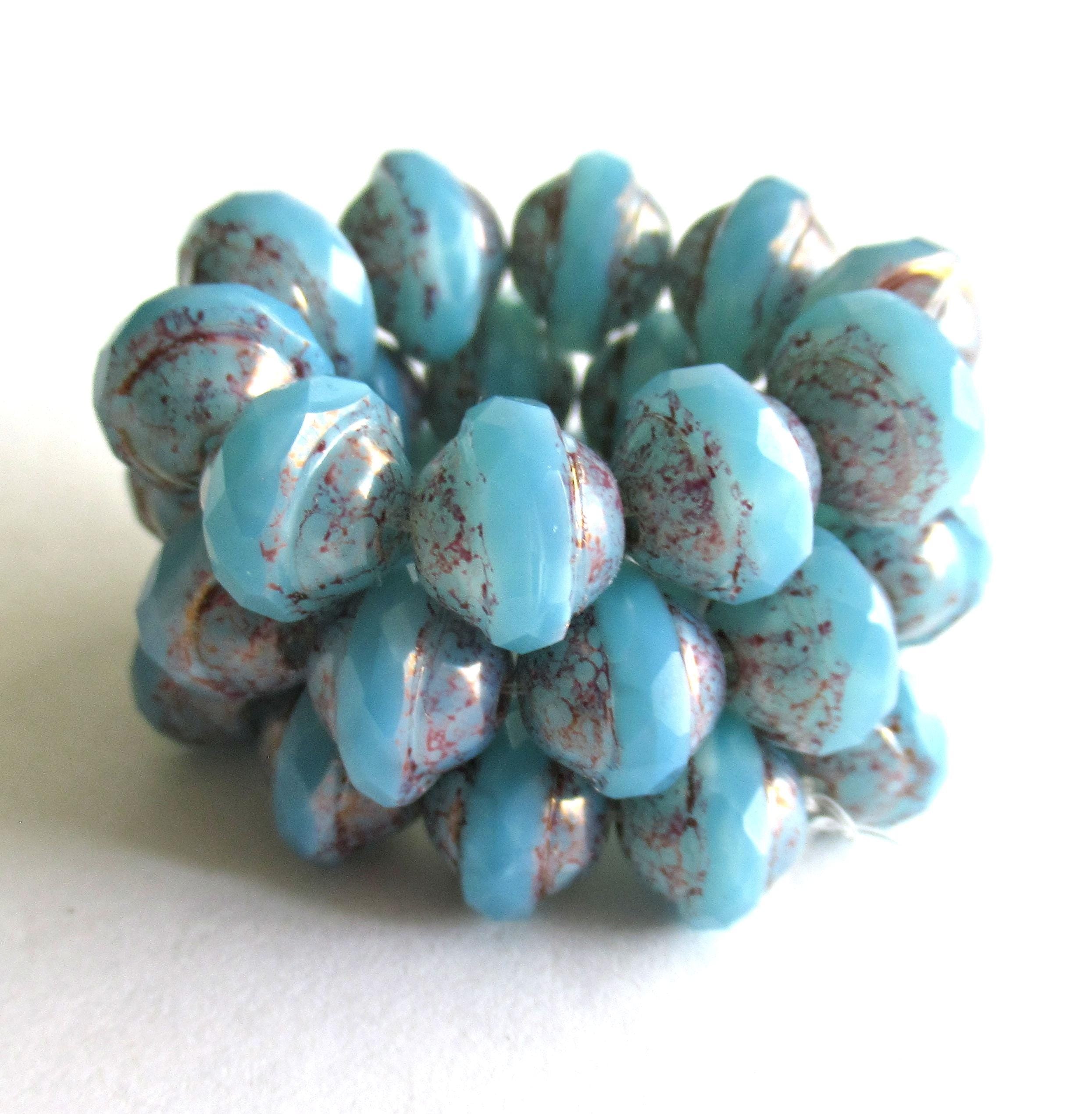 Ten Czech glass saturn or saucer beads - 8 x 10mm - translucent blue opal faceted beads with a splotchy purple picasso finish - C00661