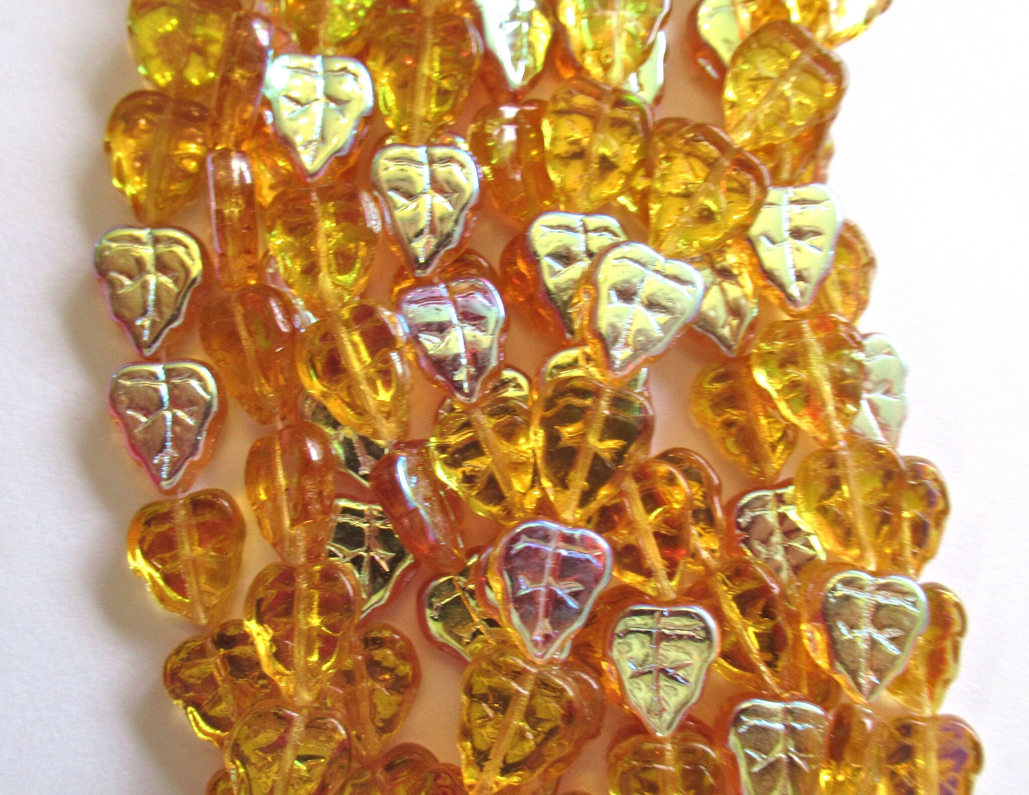25 Czech glass leaf beads - Amber Topaz AB - center drilled 8 x 10mm beads C0035