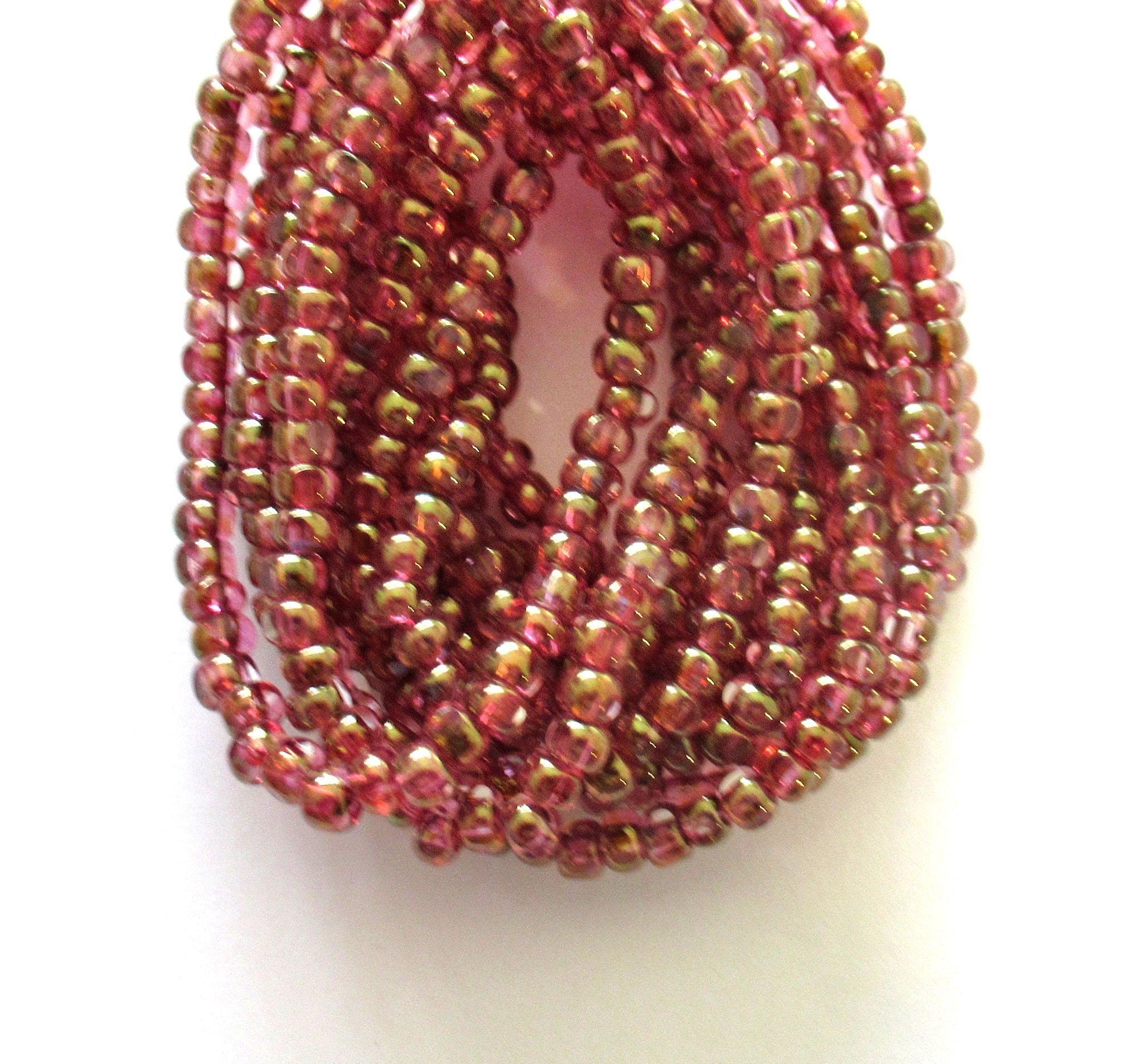 Fifty 6/0 faceted Czech glass seed beads -transparent pink with a gold luster finish seed beads C0099