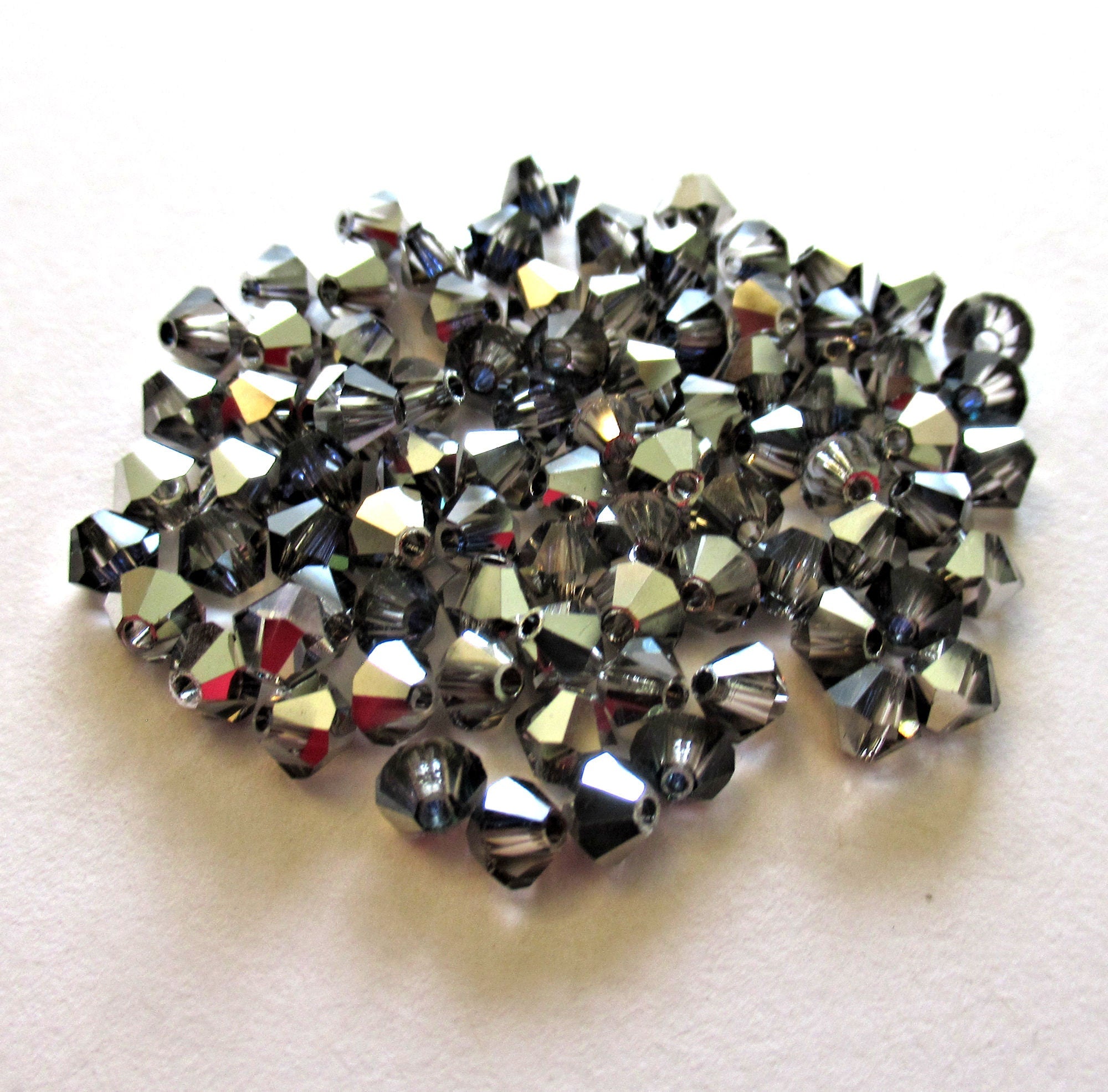 Lot of 24 4mm Crystal Heliotrope AB Czech Preciosa Crystal bicone beads - faceted silver, blue violet bicones C0035