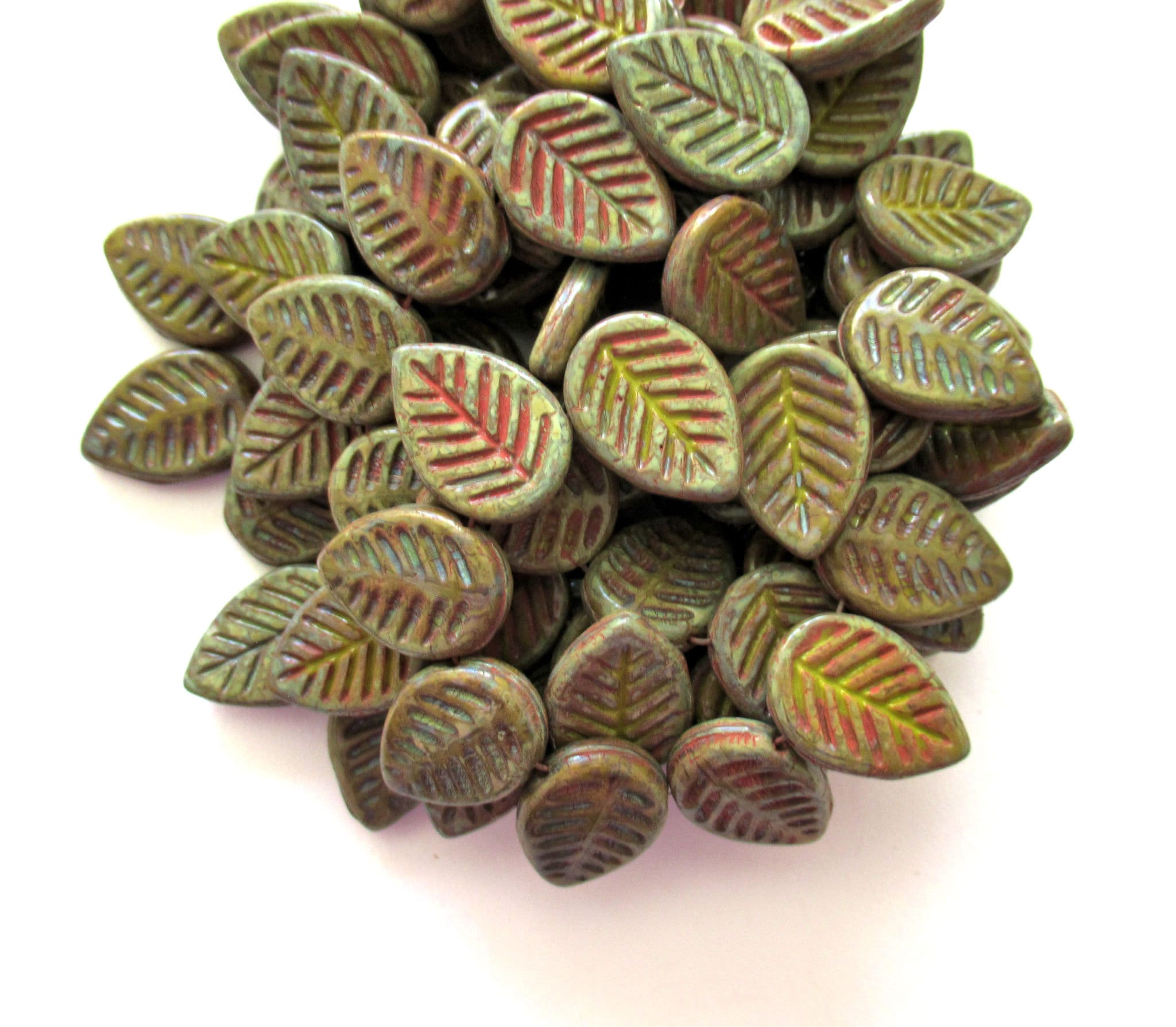Ten large Czech glass leaf beads - side drilled artichoke green beads with a coral wash- 12 x 16mm carved beads C00831