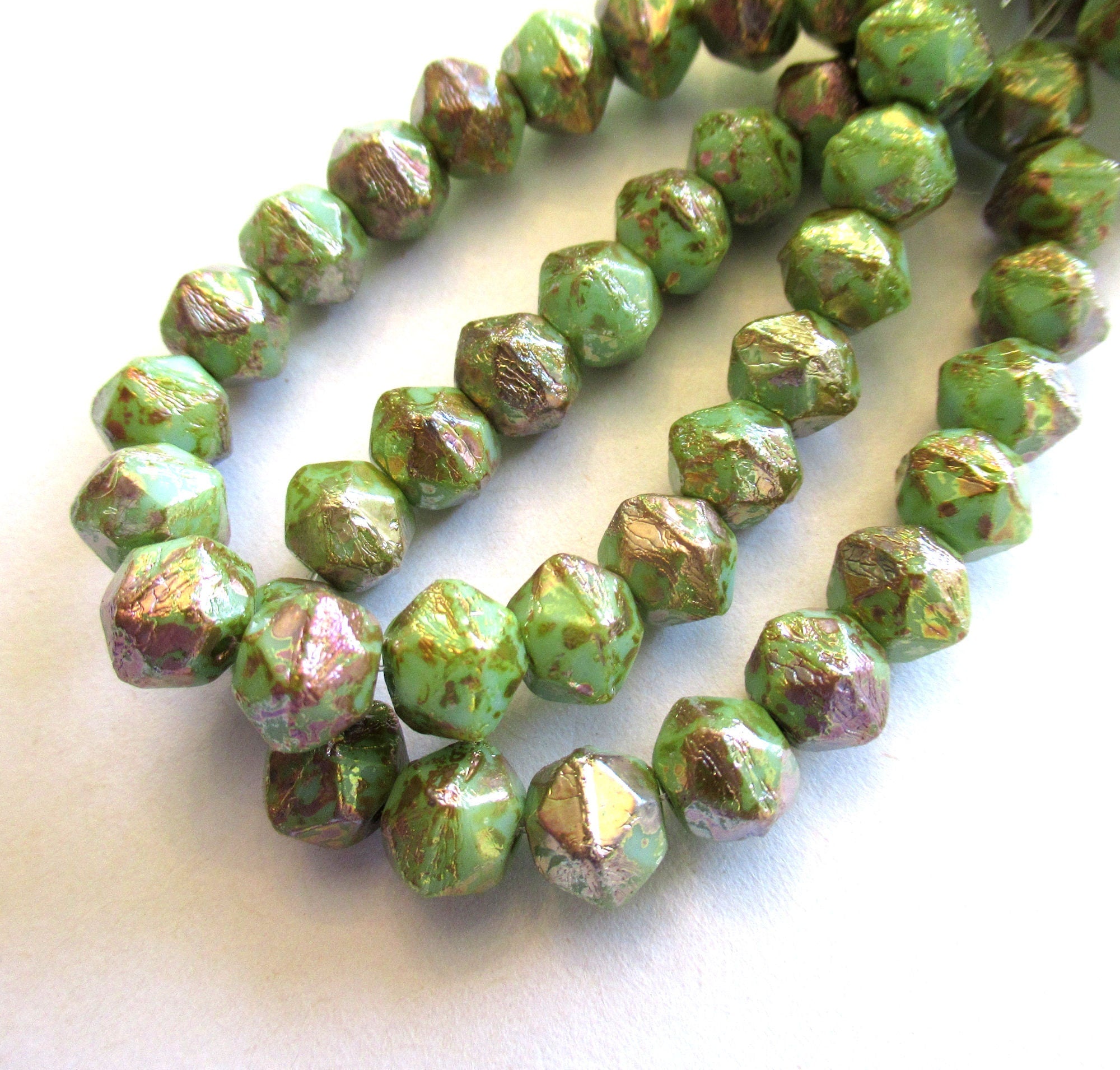 20 8mm Czech glass faceted English cut beads - green beads with a gold picasso finish - C00031