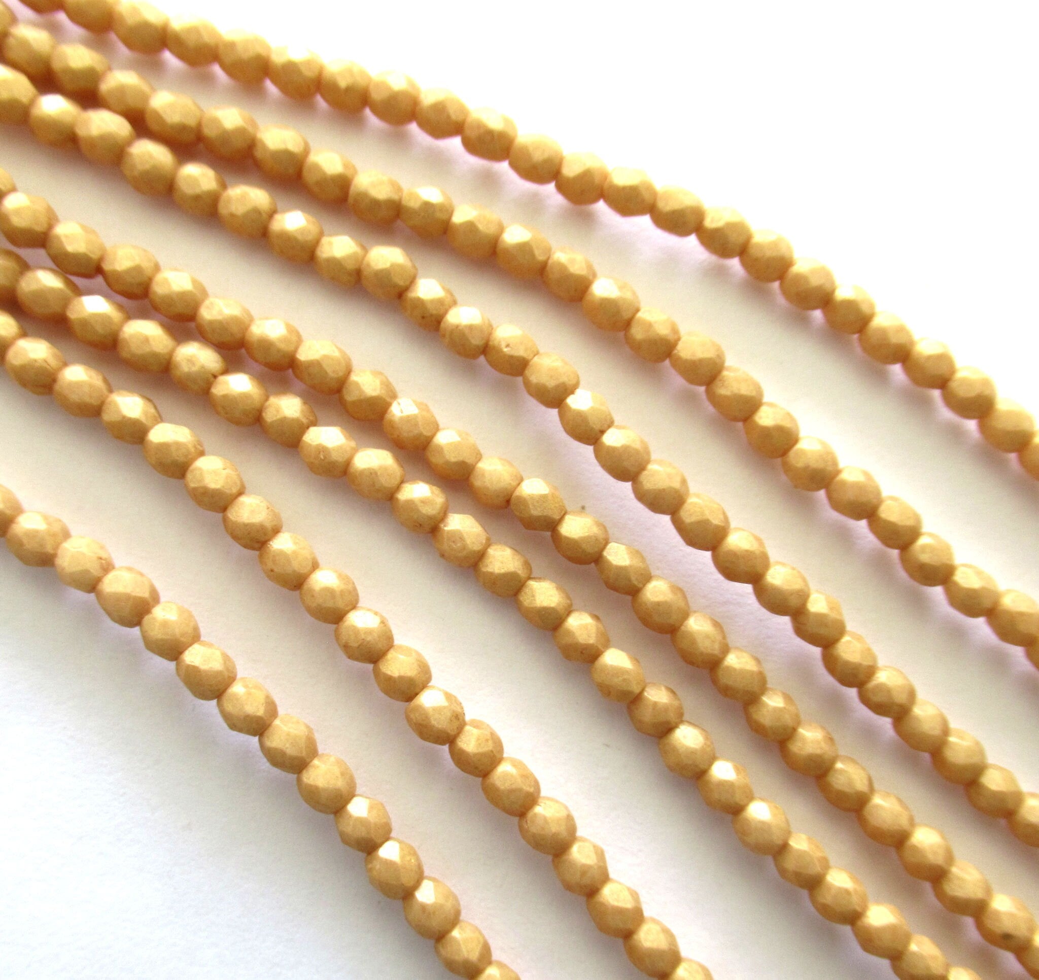 50 3mm Czech glass beads - faceted, fire polished neutral opaque beige, yellow / gold Pacifica Ginger beads C0085