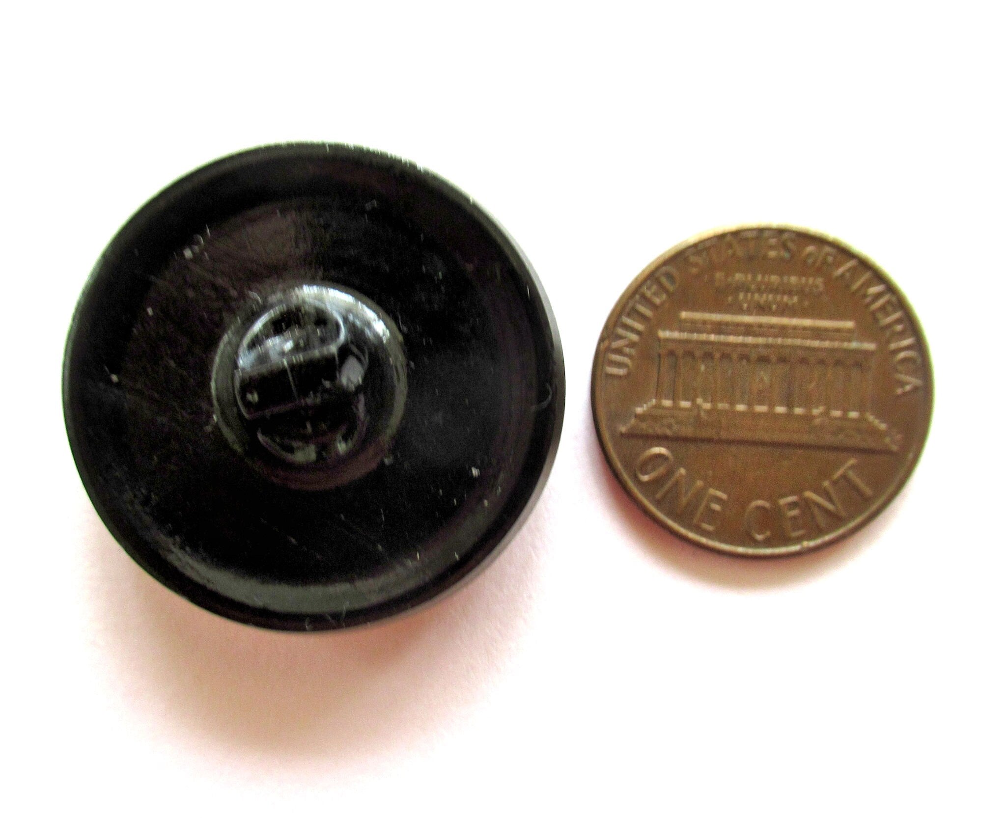 One 27mm Czech glass button, dark brown metallic luster with a raised star pattern, a decorative shank button 08201