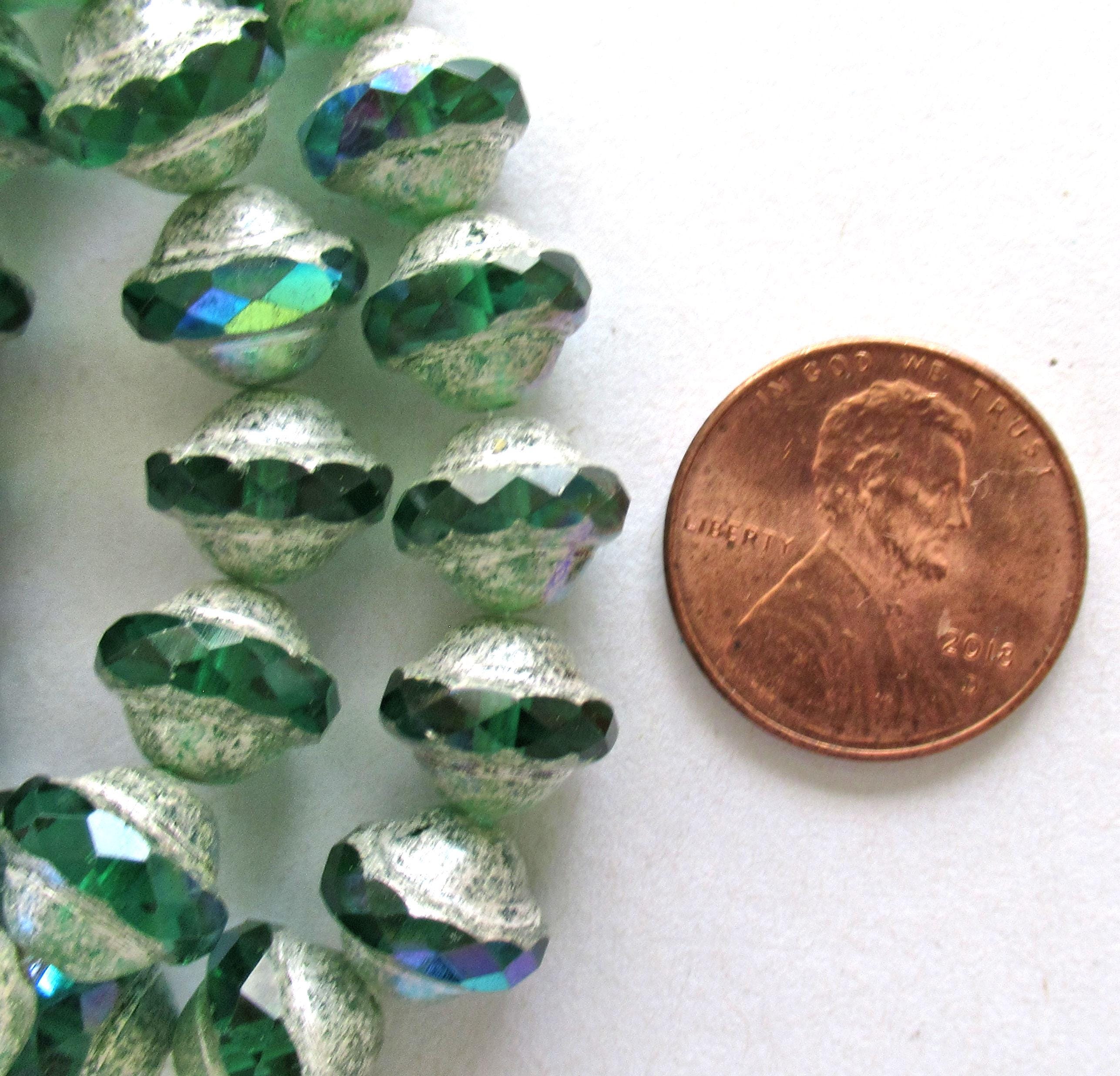 Fifteen Czech glass faceted saturn / saucer beads - 8 x 10mm - emerald green ab with antique silver picasso accents - C00081