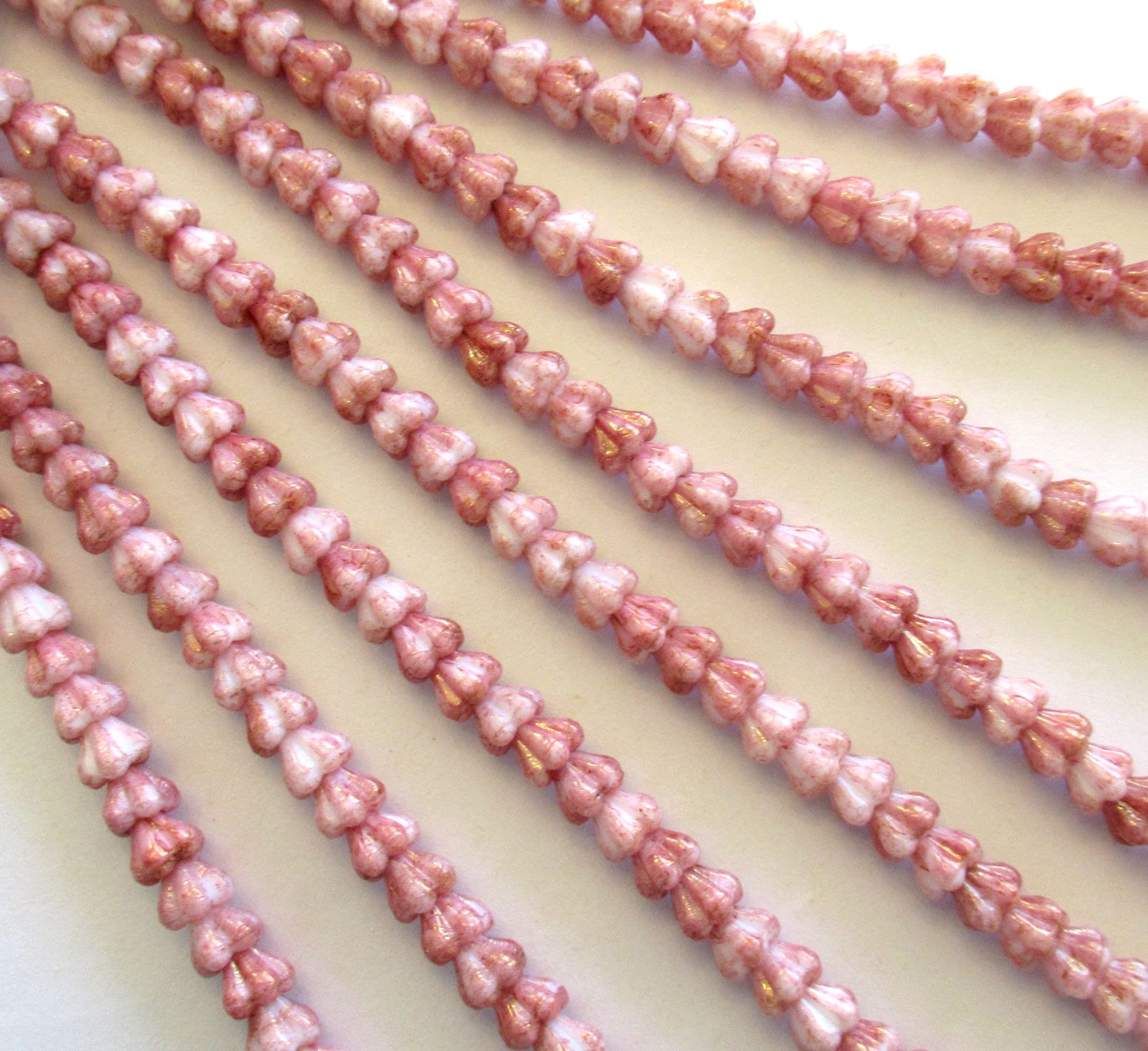 50 6mm x 4mm Czech glass baby bell flower beads - opaque dark coral pink & white with a luster finish - pressed glass beads C0029