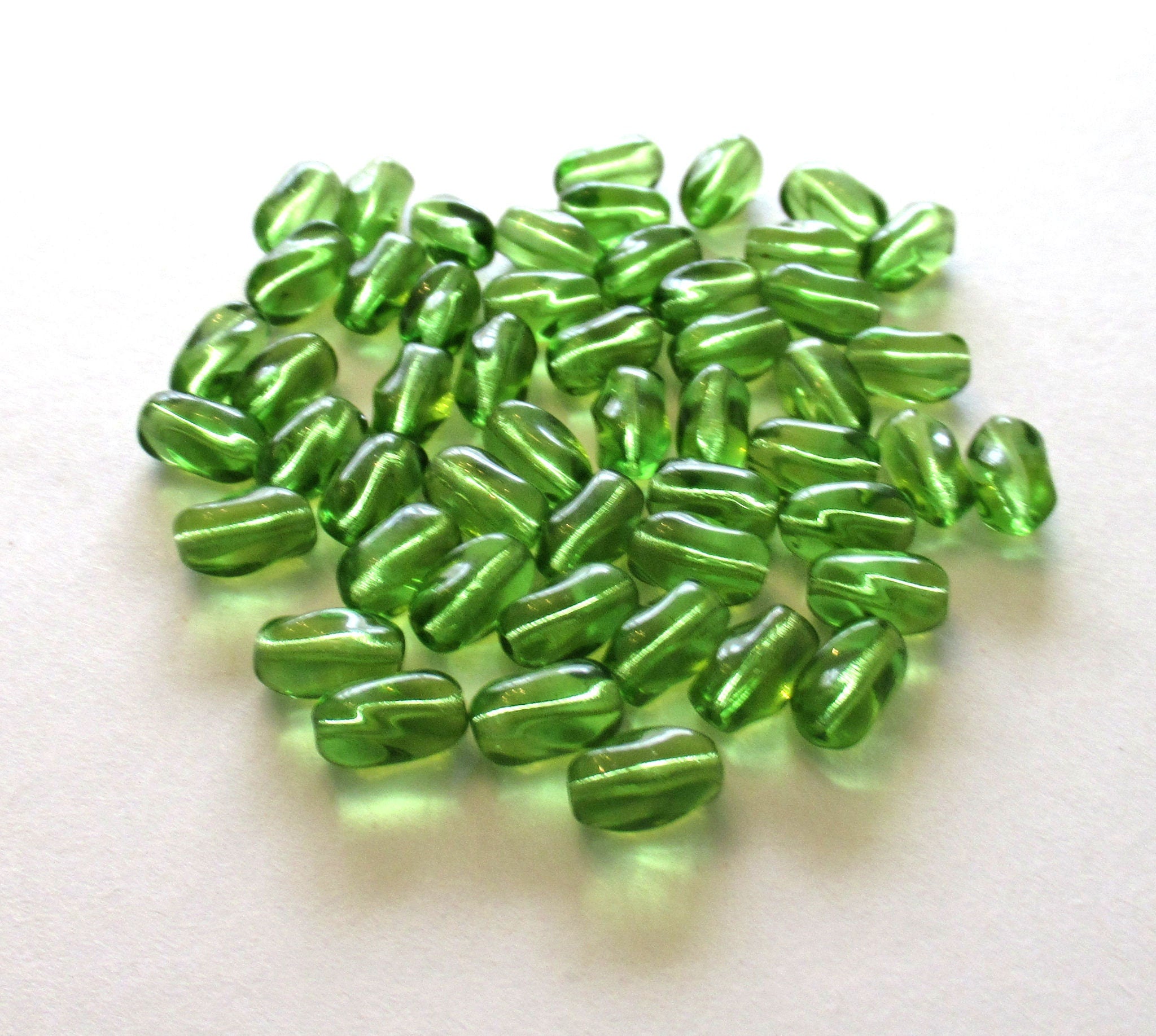 25 Czech glass beads - 9mm x 6mm olivine green glass twisted oval beads C0062
