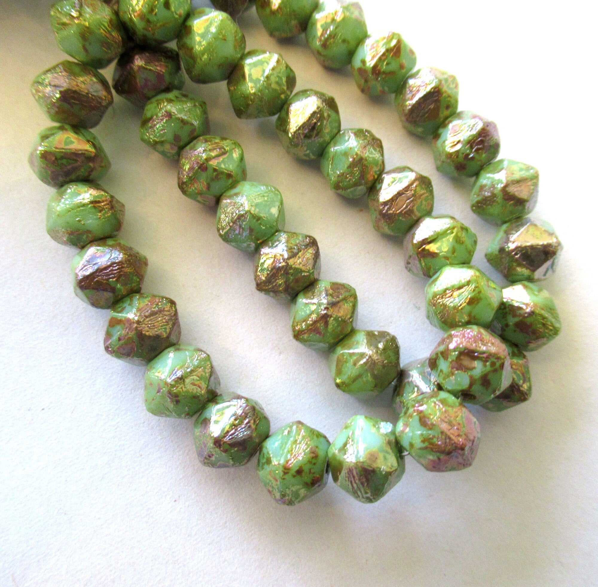 20 8mm Czech glass faceted English cut beads - green beads with a gold picasso finish - C00031