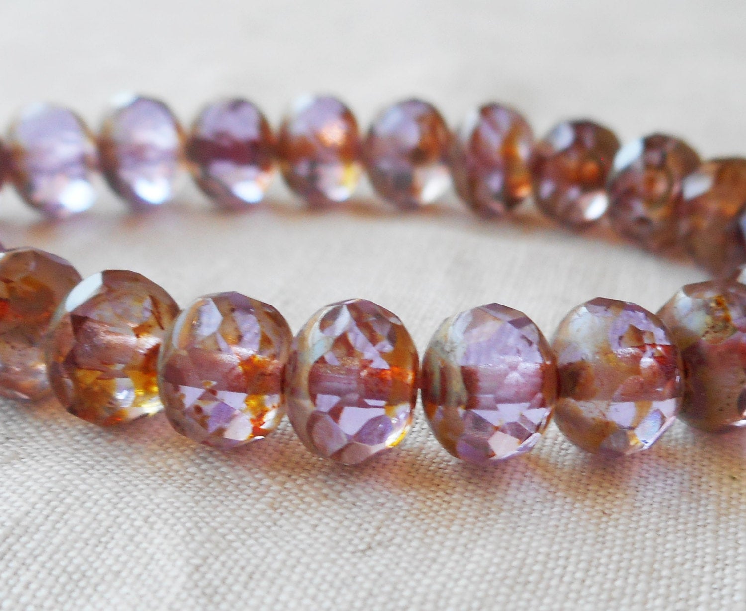 Lot of 25 Transparent light purple, lavender Picasso faceted puffy rondelle or donut beads, 5 x 7mm Czech glass beads C52201