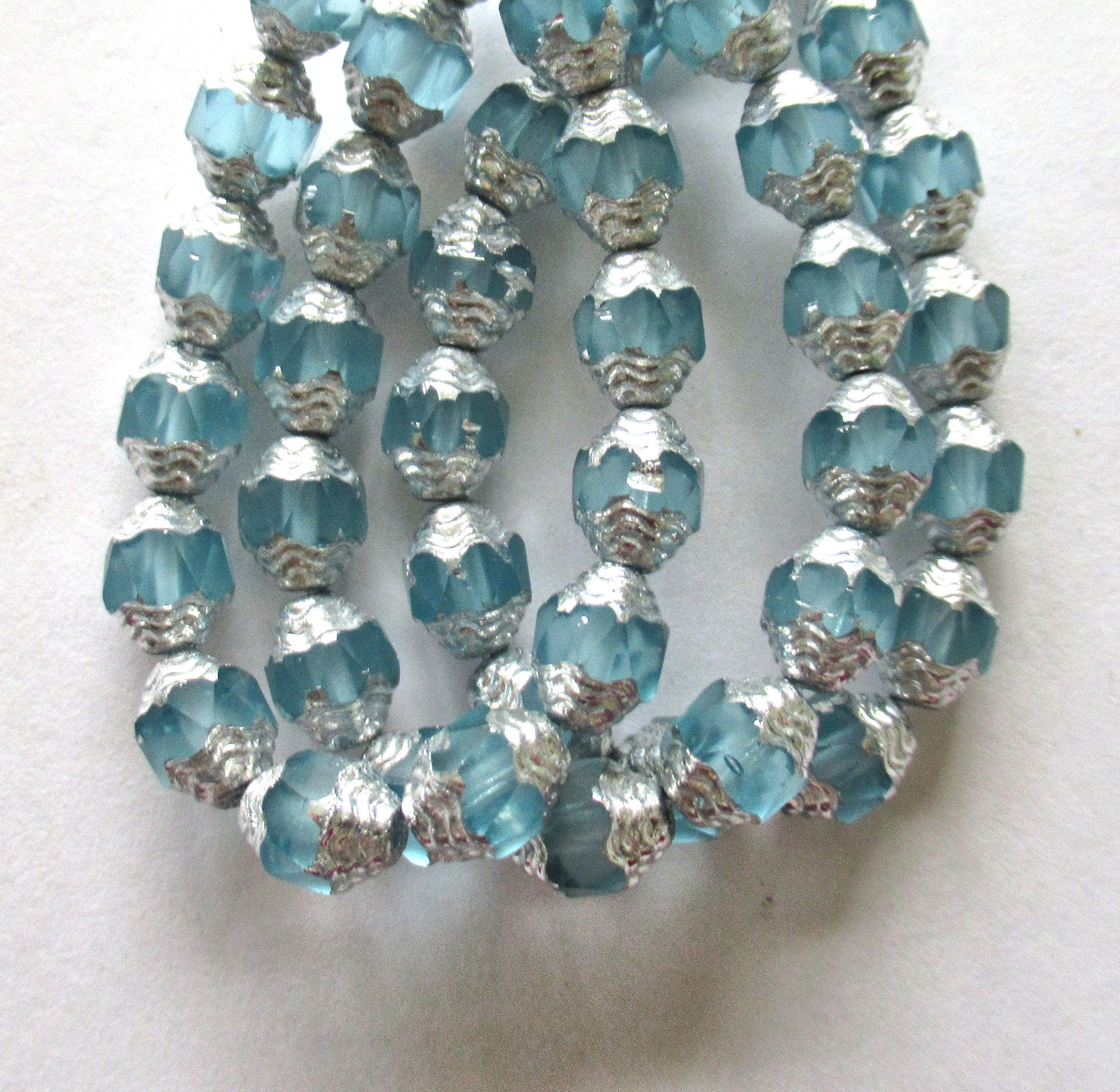 15 Czech glass mini antique style faceted oval cathedral beads - 8 x 6mm matte ice blue with silver accents - C00071