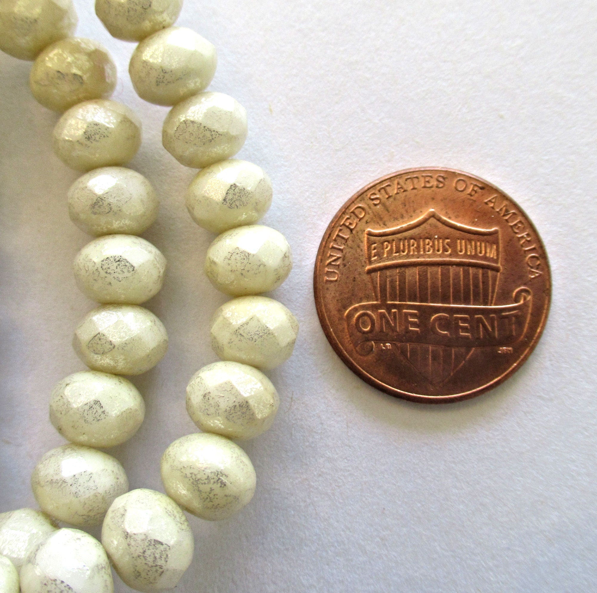 Lot of 25 Czech glass faceted puffy rondelle beads - 5 x 7mm opaque off white / ivory with a splotchy mercury finish - rondelles C00014