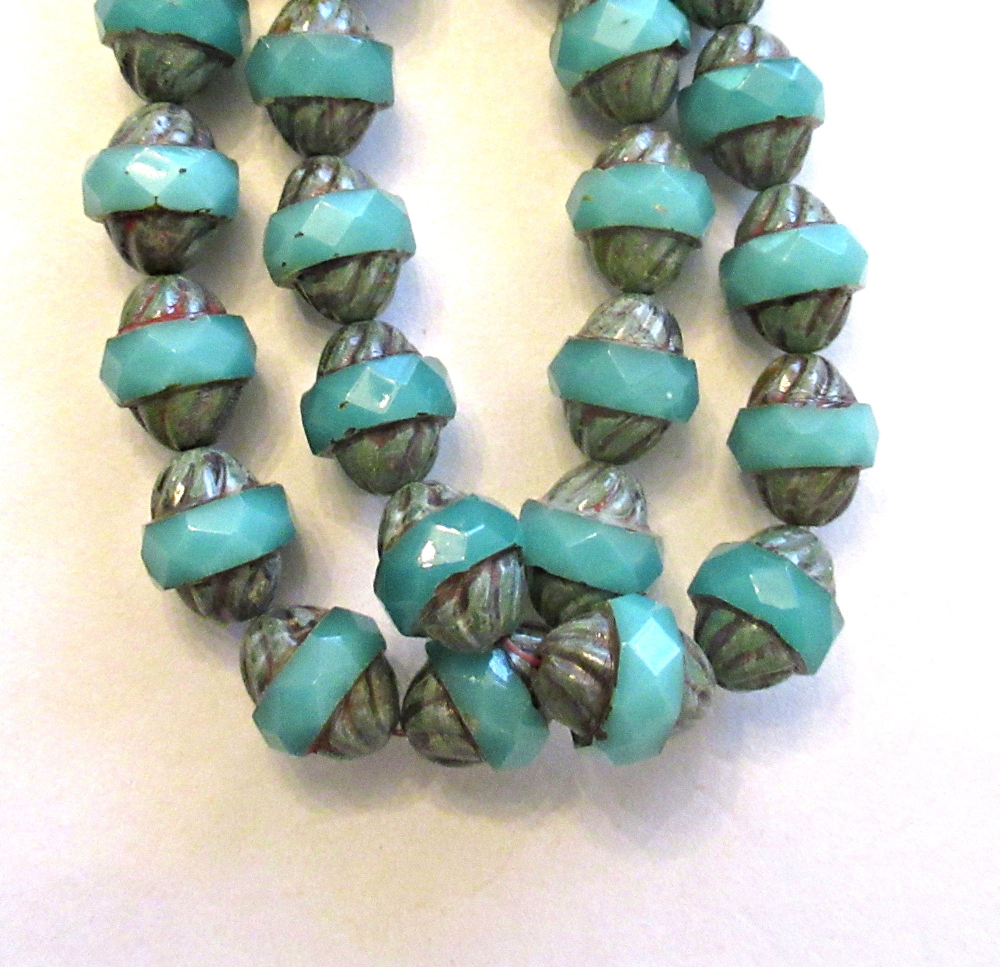 Ten Czech glass turbine beads - 11 x 10mm light translucent milky blue green faceted saucer beads with a Picasso finish C00681