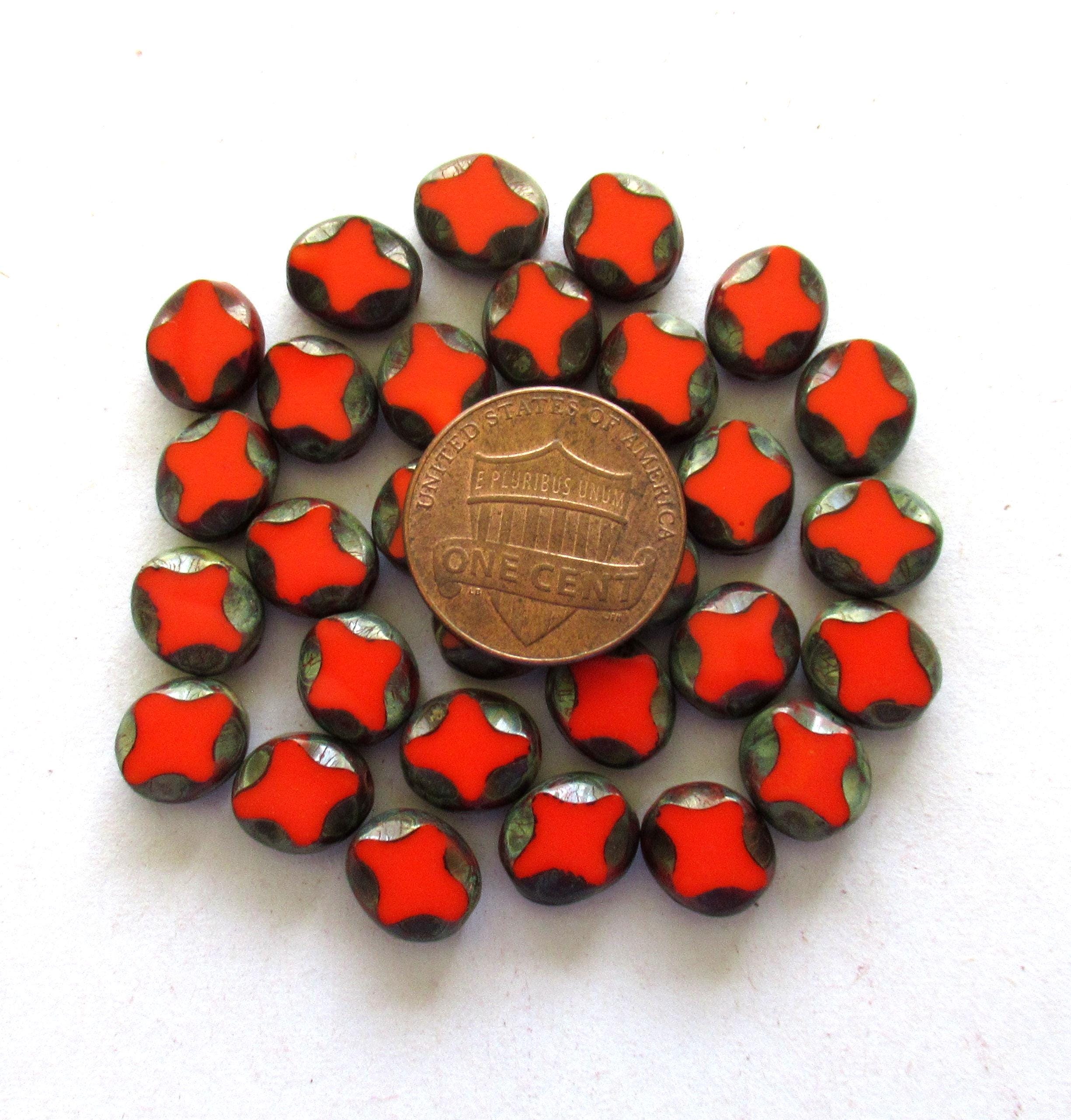 15 Czech glass oval beads - 9 x 8mm - coral red oval with a Picasso finish - carved table cut beads with a diamond pattern - C0251