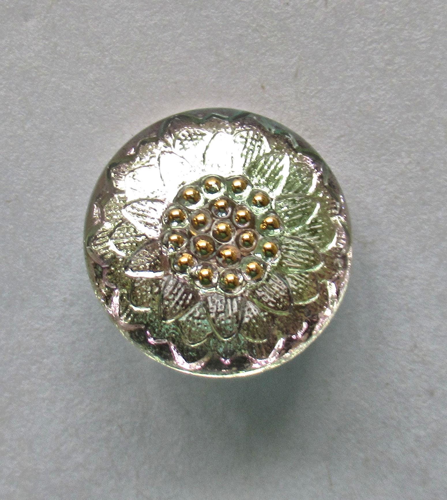 One 18mm Czech glass button - crystal silver flower with gold accents & a slight lavender tint - decorative floral shank button - 00582