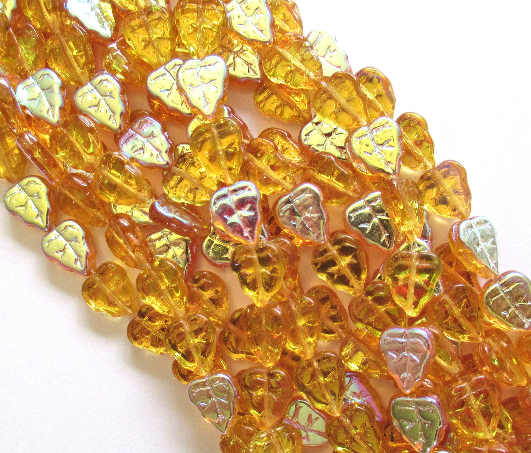 25 Czech glass leaf beads - Amber Topaz AB - center drilled 8 x 10mm beads C0035