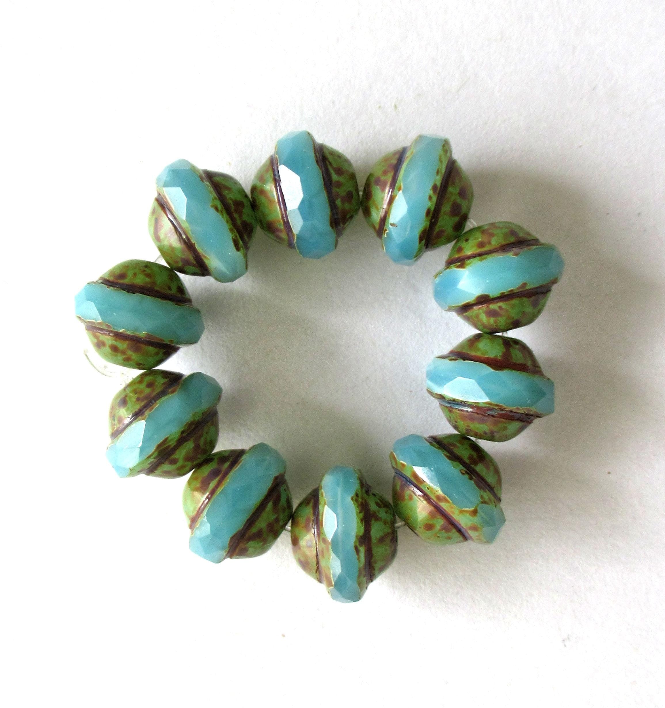 Ten Czech glass saturn or saucer beads - 8 x 10mm translucent sky blue opal faceted beads with a picasso finish - C00651