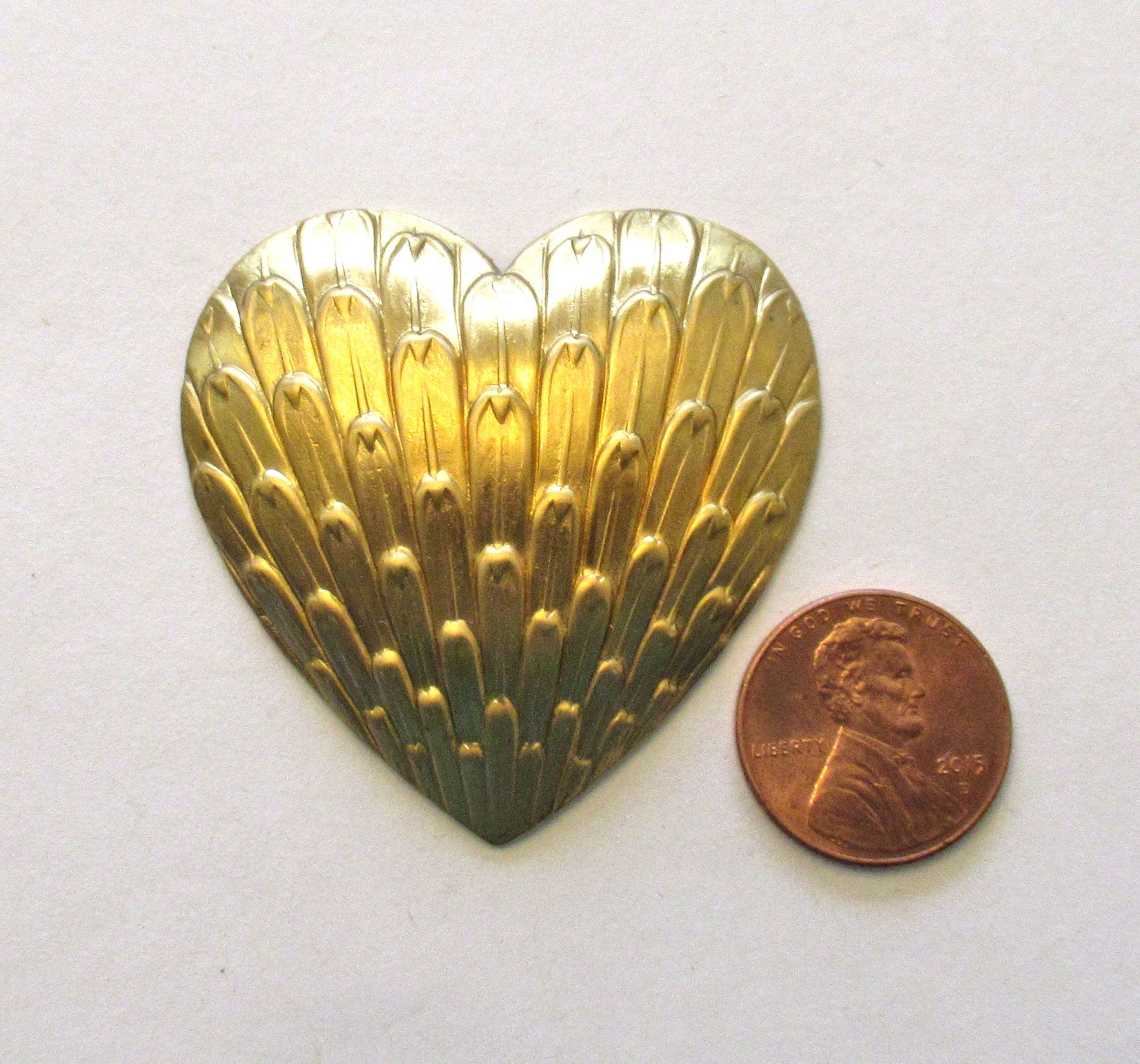 1 raw brass stylized heart stamping - domed and hollow backed - 1.75" x 1.75" inches - made in the USA - C0005