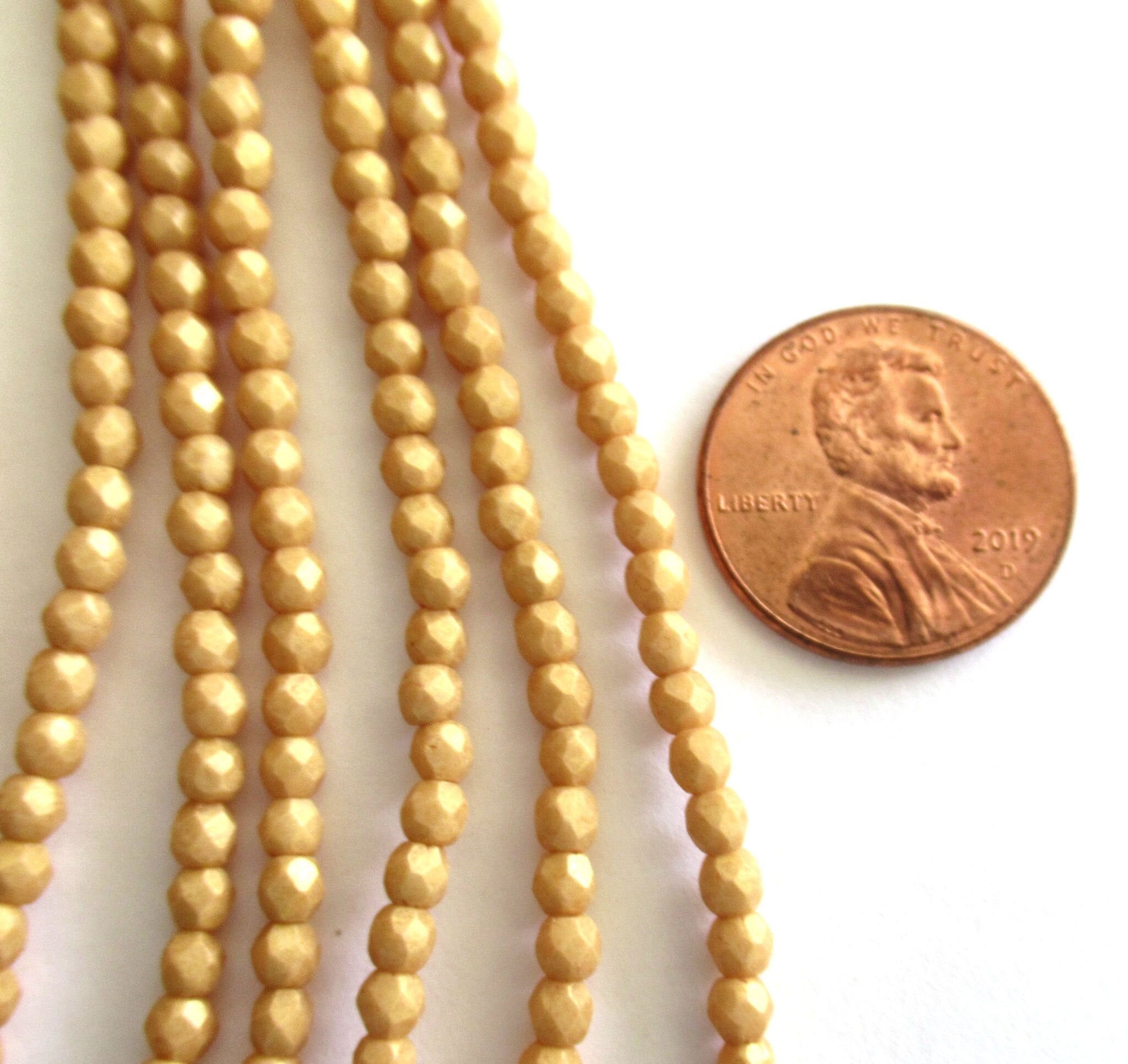 50 3mm Czech glass beads - faceted, fire polished neutral opaque beige, yellow / gold Pacifica Ginger beads C0085
