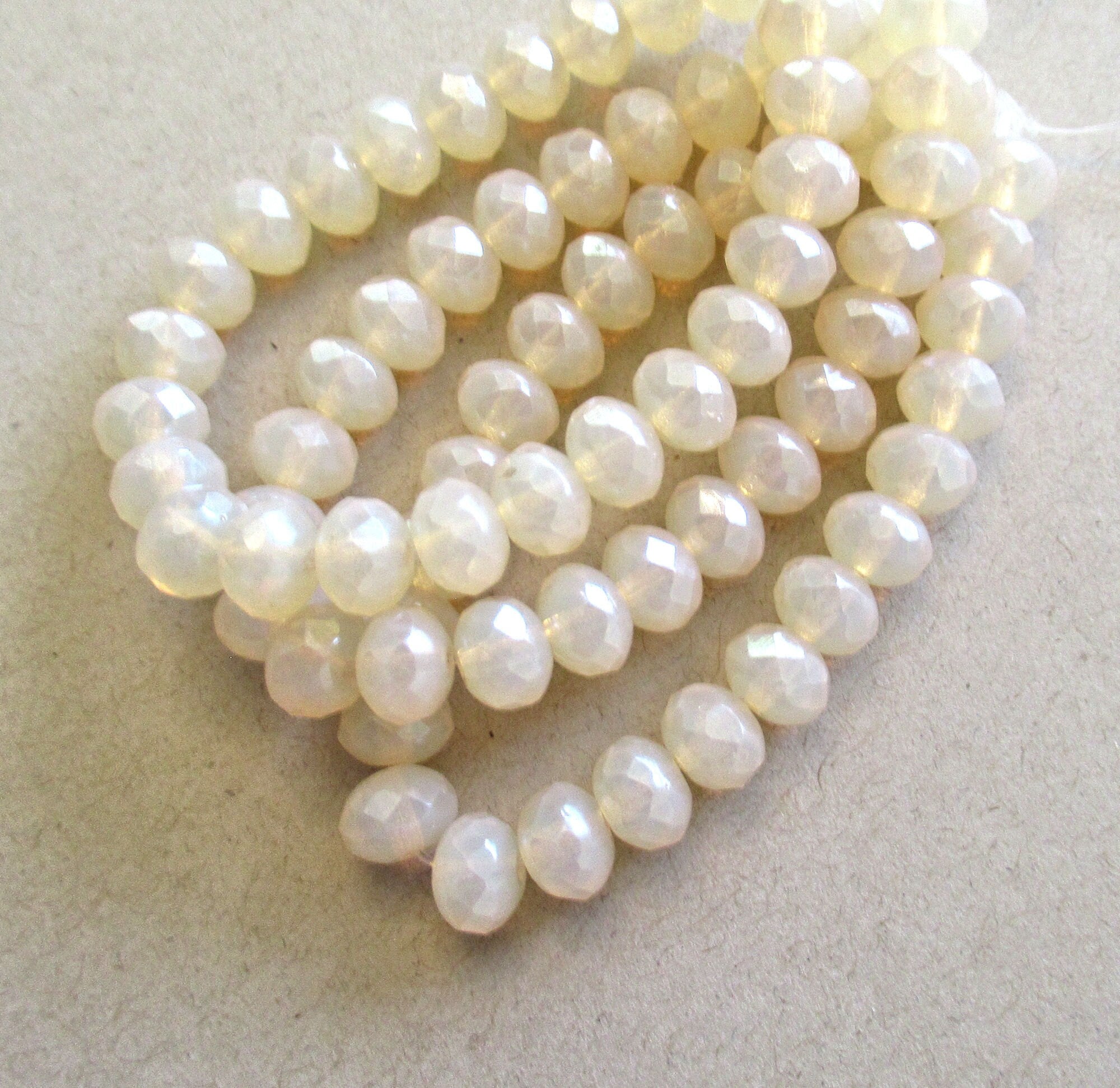 Lot of 25 Czech glass puffy rondelles - translucent beige / off white / milky opalite - 5 x 7mm faceted rondelles 00641