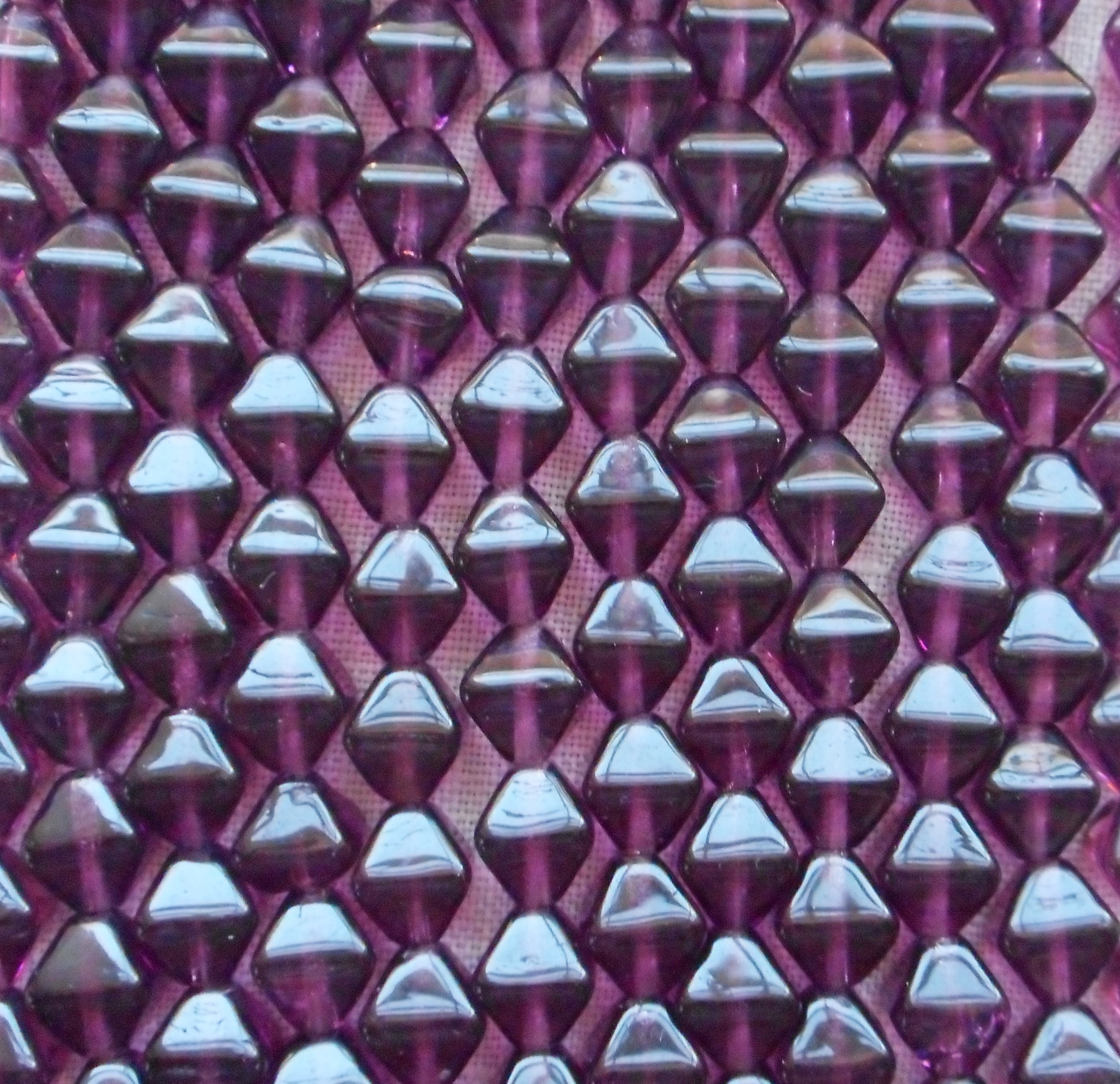 Fifty 6mm Amethyst bicones, Purple pressed glass Czech bicone beads C7501