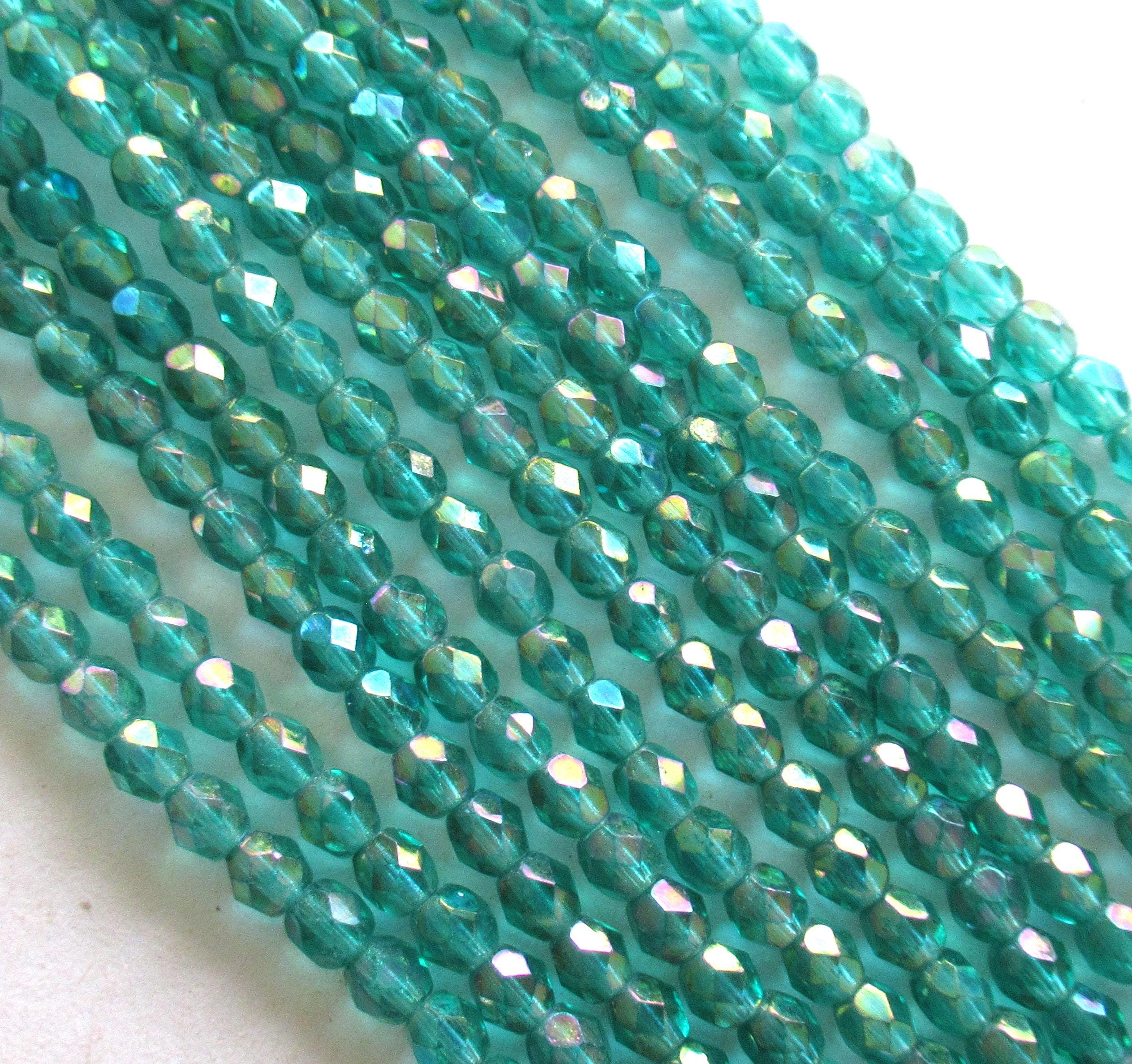 Lot of 50 4mm Czech round glass beads - light teal blue green luster iris - faceted fire polished beads C0075