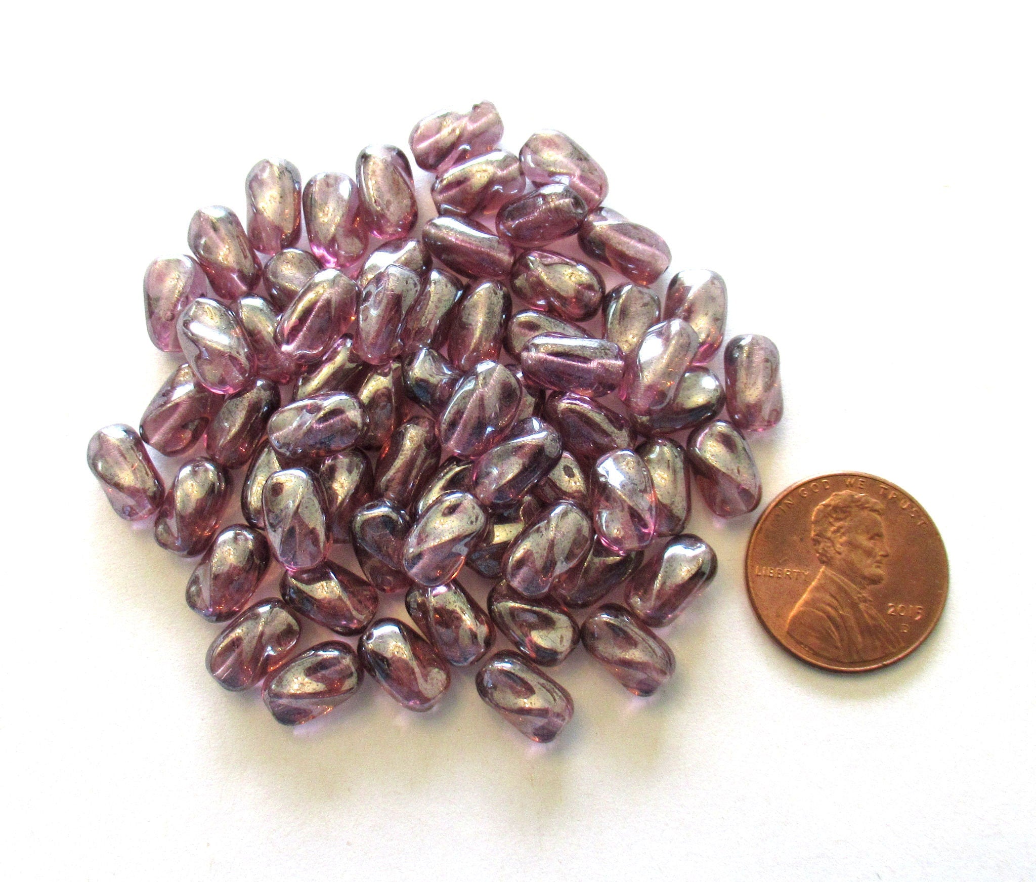 25 9mm x 6mm amethyst shimmer purple Czech glass twisted oval beads C0004