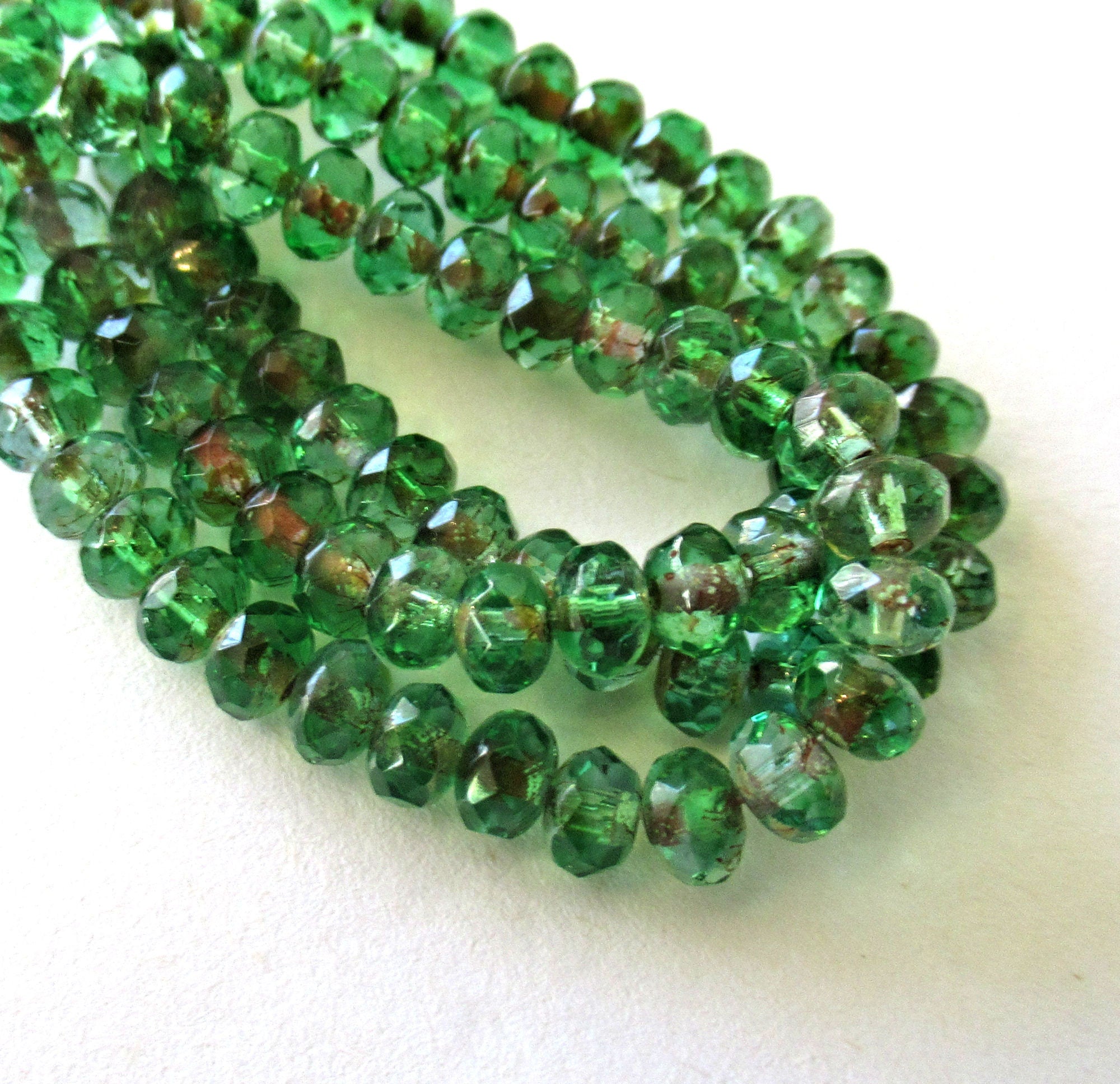 Lot of 30 small 3 x 5mm Czech glass puffy rondelle beads - transparent green & blue picasso faceted, fire polished puffy rondelles 0089