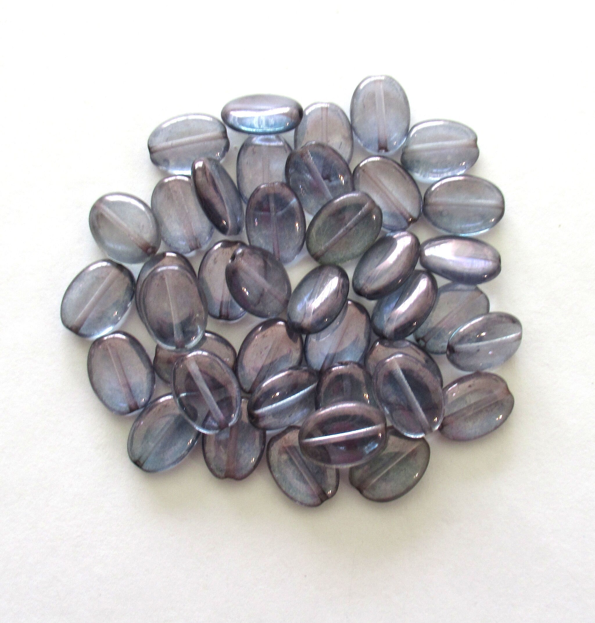 25 Czech glass flat oval beads - lumi blue beads with a light Iridescent purple finish - 12mm x 9mm pressed glass beads C0076