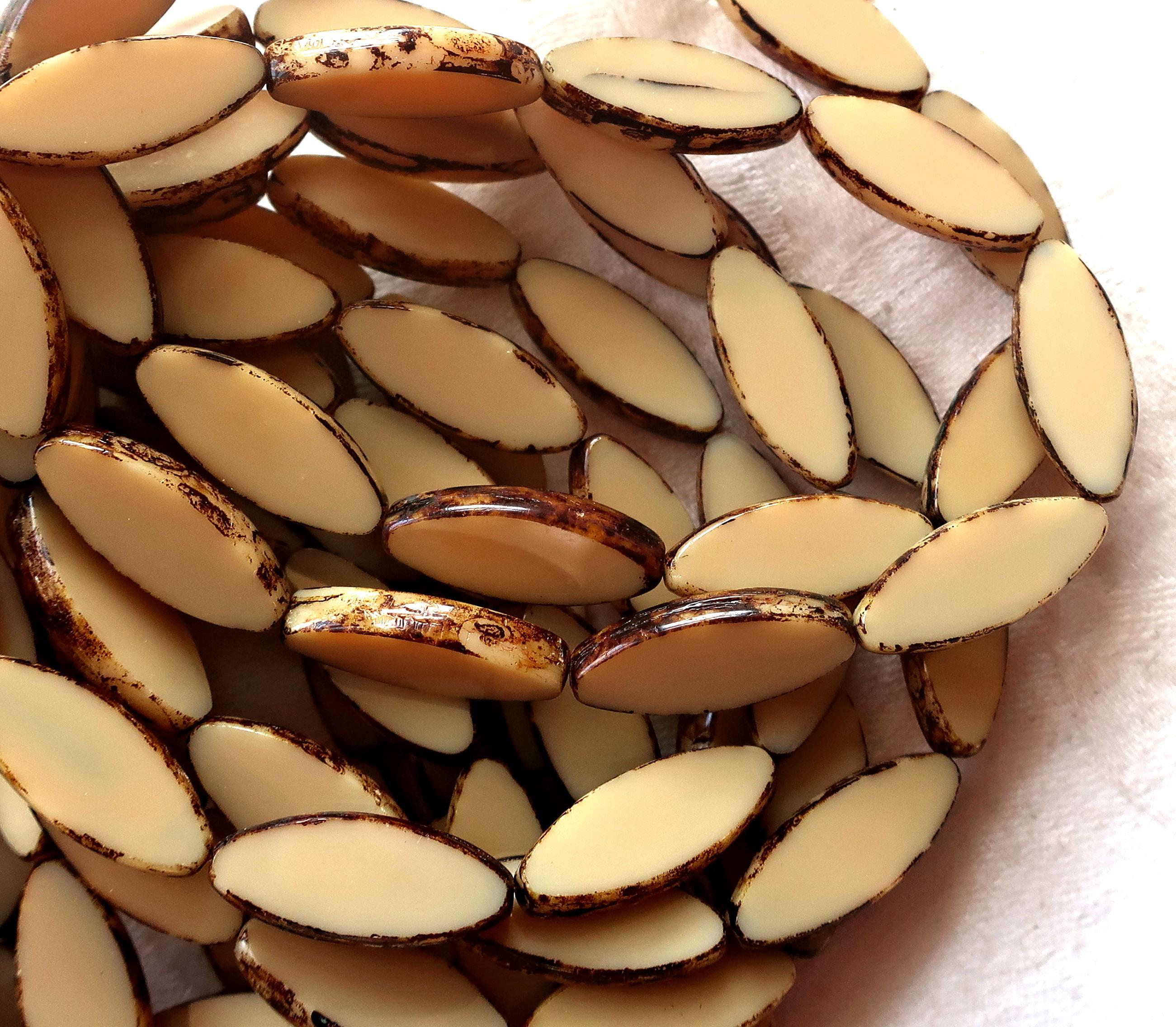 Ten Czech glass spindle beads, 20 x 9mm, neutral opaque beige, off white picasso, table cut, almond or tube shaped beads C76101