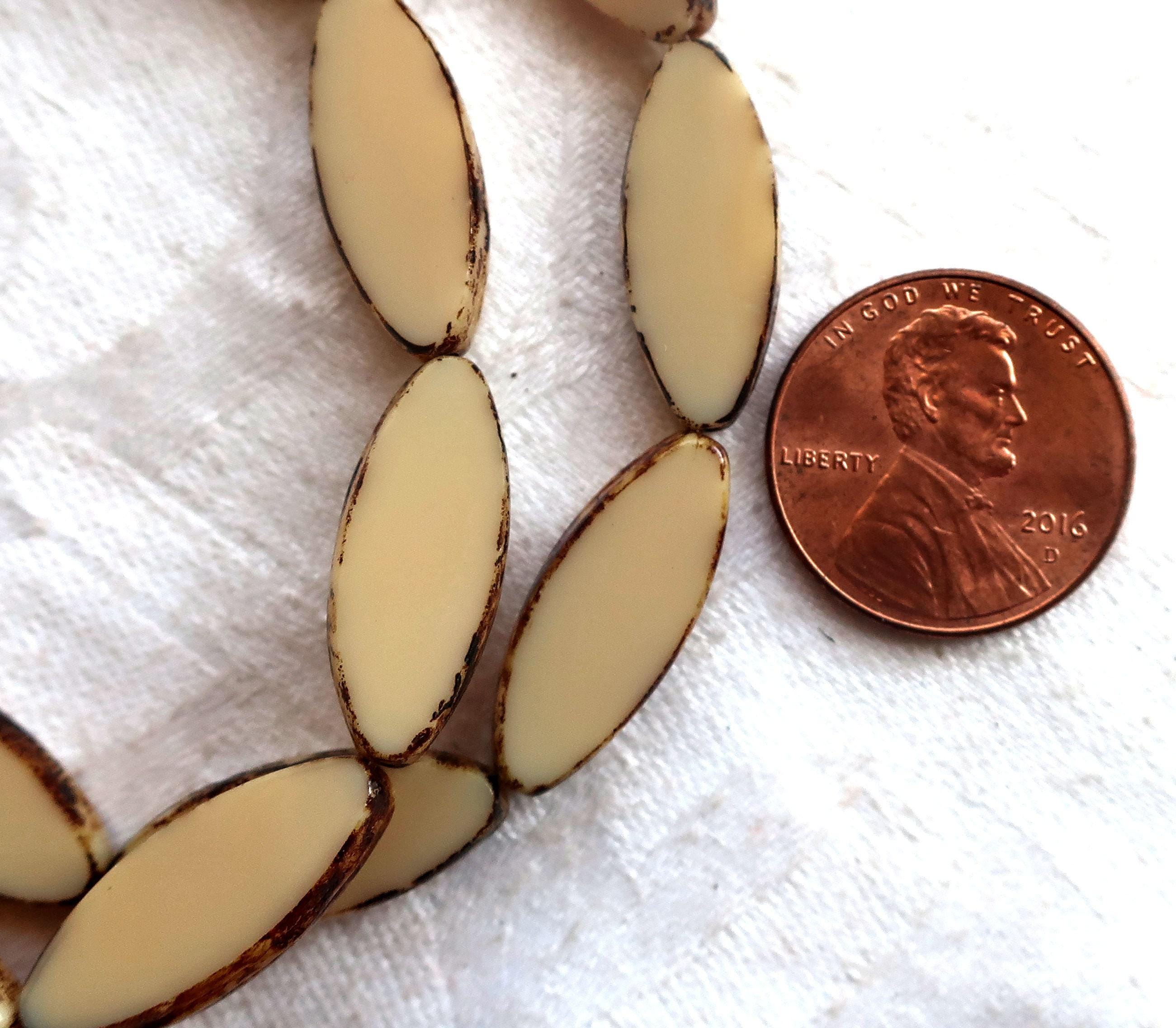 Ten Czech glass spindle beads, 20 x 9mm, neutral opaque beige, off white picasso, table cut, almond or tube shaped beads C76101