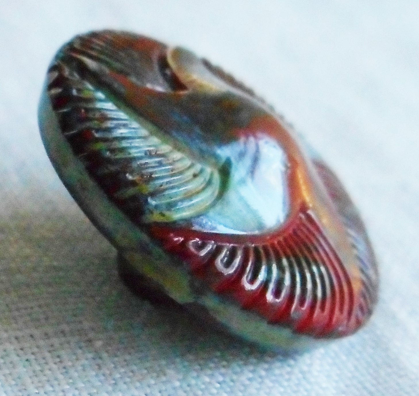 One 18mm Czech glass button - opaque dark red raised swirling star with a picasso finish - decorative shank button 00081