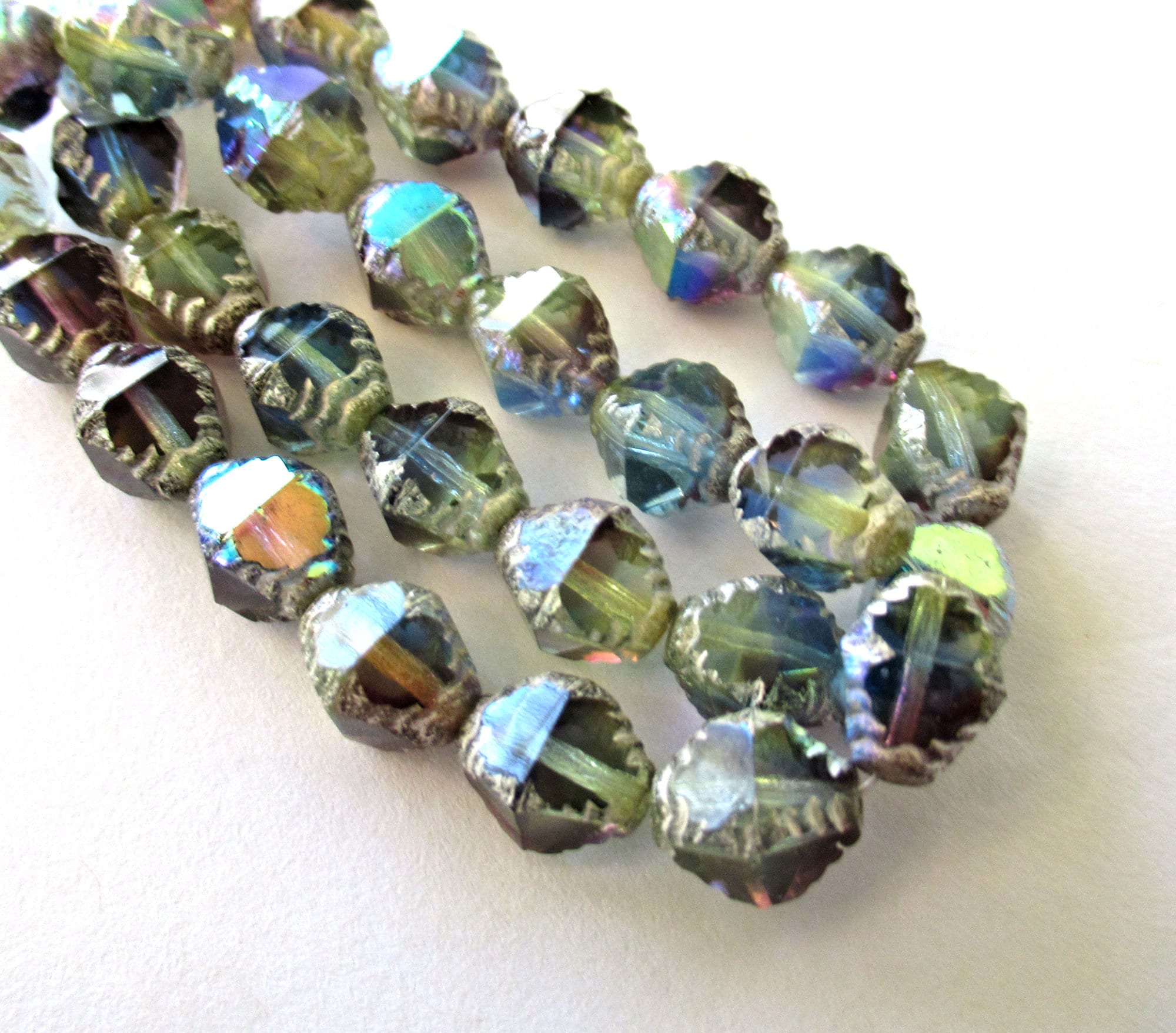 Fifteen Czech glass bicones - 10 x 8mm color mix ab w/ silver accents - table cut carved notched bicone beads - C00542