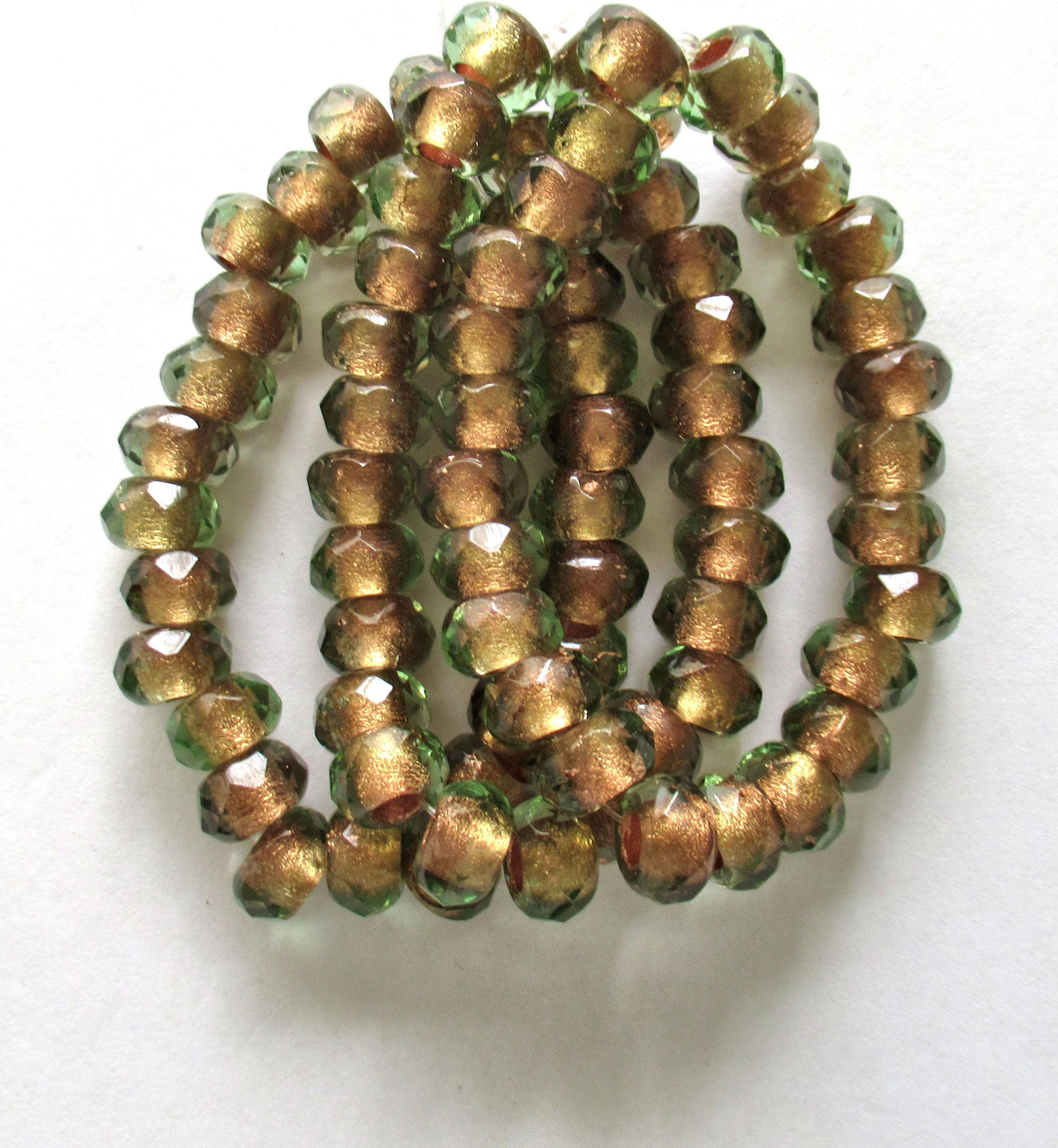 Ten Czech glass roller beads - 9 x 6mm - light green copper lined - faceted - big 3.5mm hole roller - rondelle - donut beads C00911