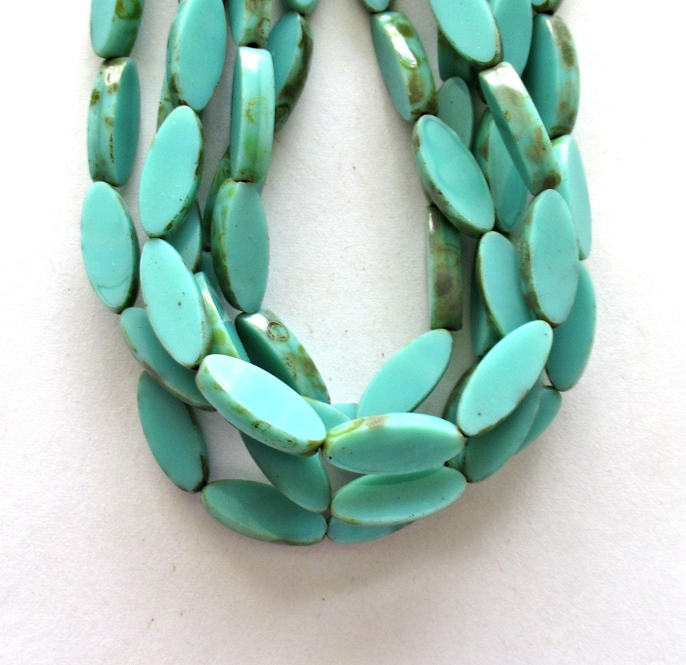 Ten Czech glass green spindle beads - 16 x 6mm - opaque light turquoise green picasso - oblong oval table cut glass beads - C00921