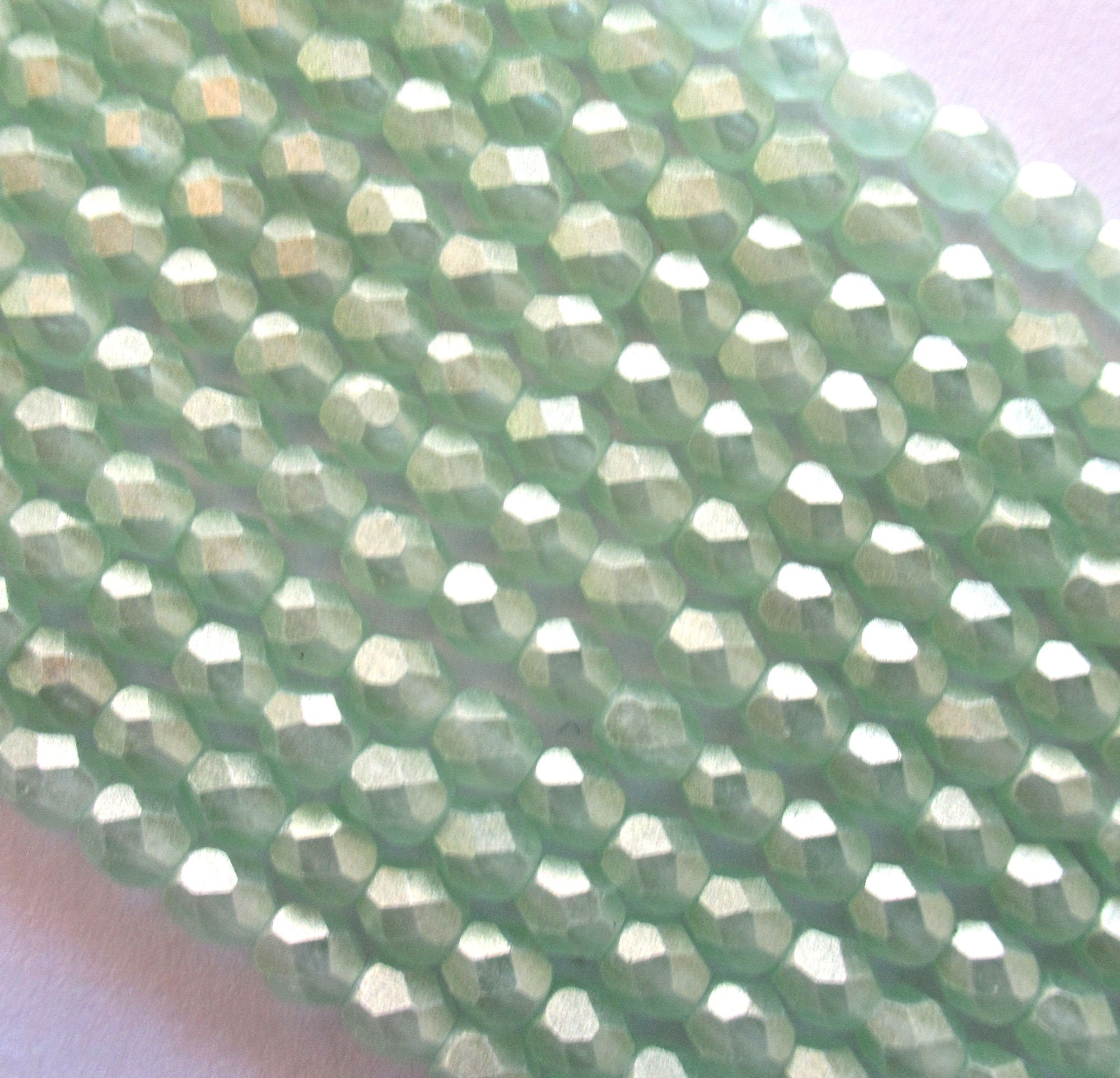 50 4mm faceted Czech glass round beads - Sueded Gold Peirdot - light green with a gold finish fire polished beads - C0024