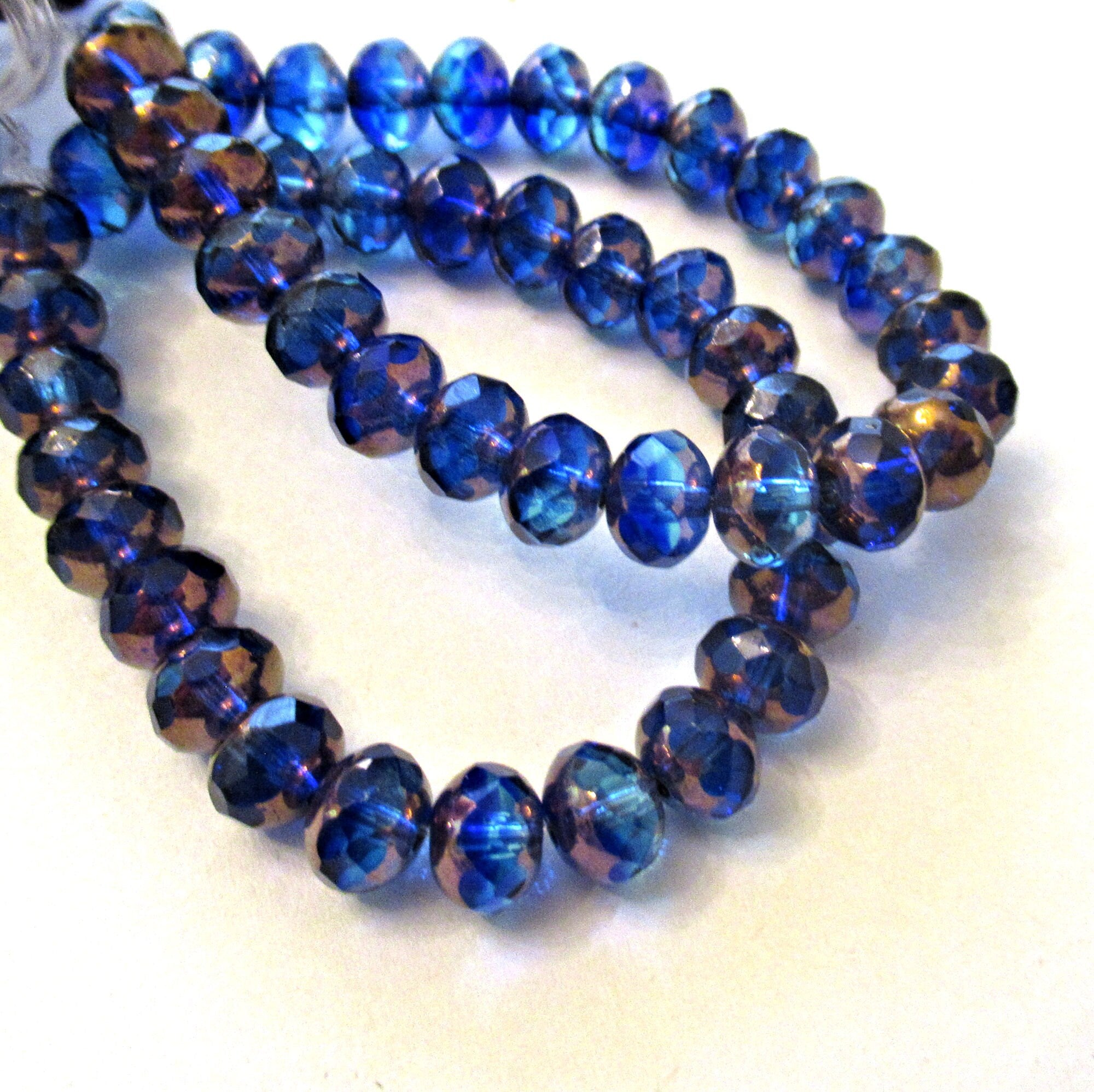 Lot of 25 faceted Czech glass puffy rondelle beads - 5 x 7mm transparent aqua and sapphire blue mix - rondelles 500851