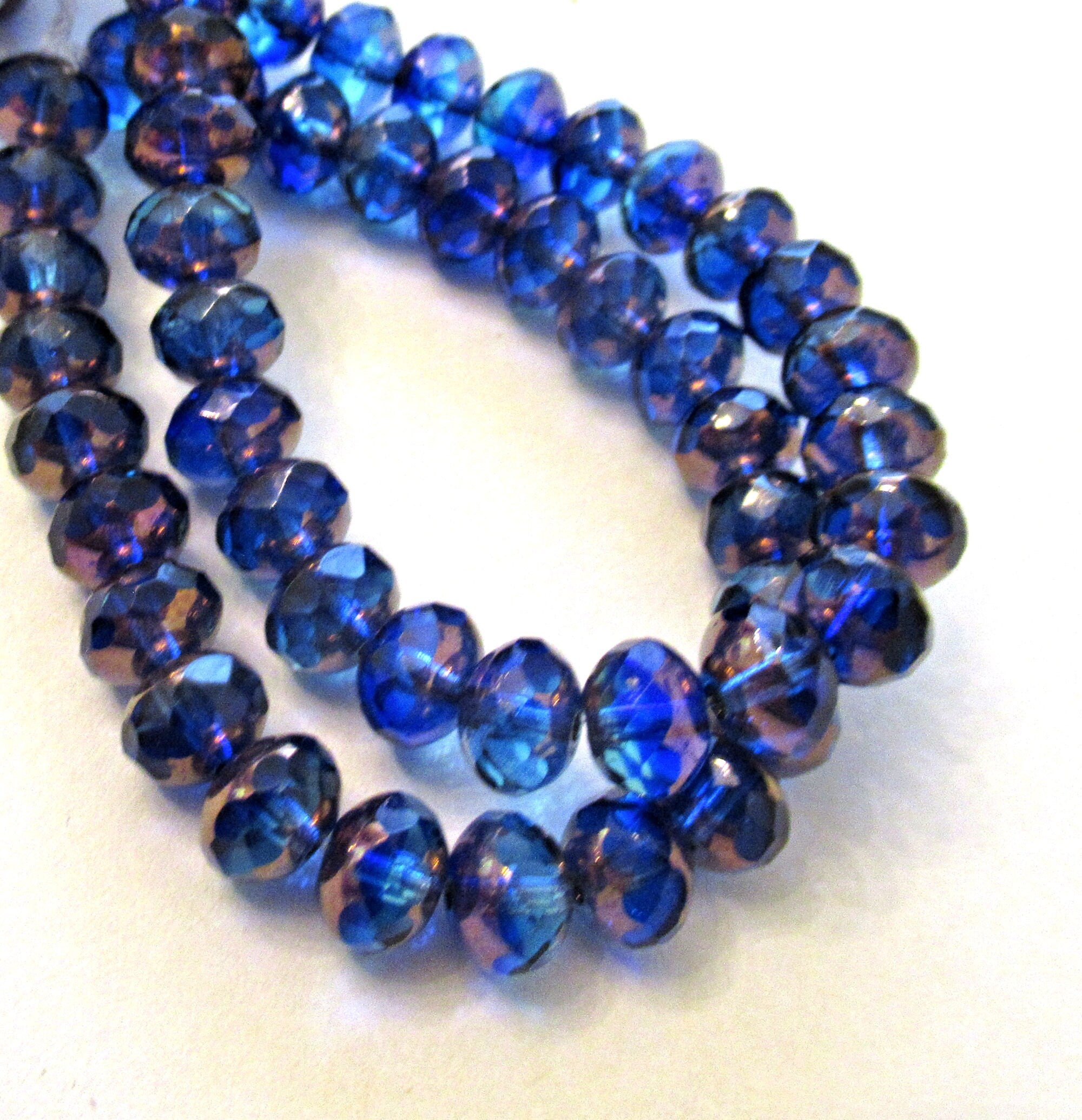 Lot of 25 faceted Czech glass puffy rondelle beads - 5 x 7mm transparent aqua and sapphire blue mix - rondelles 500851