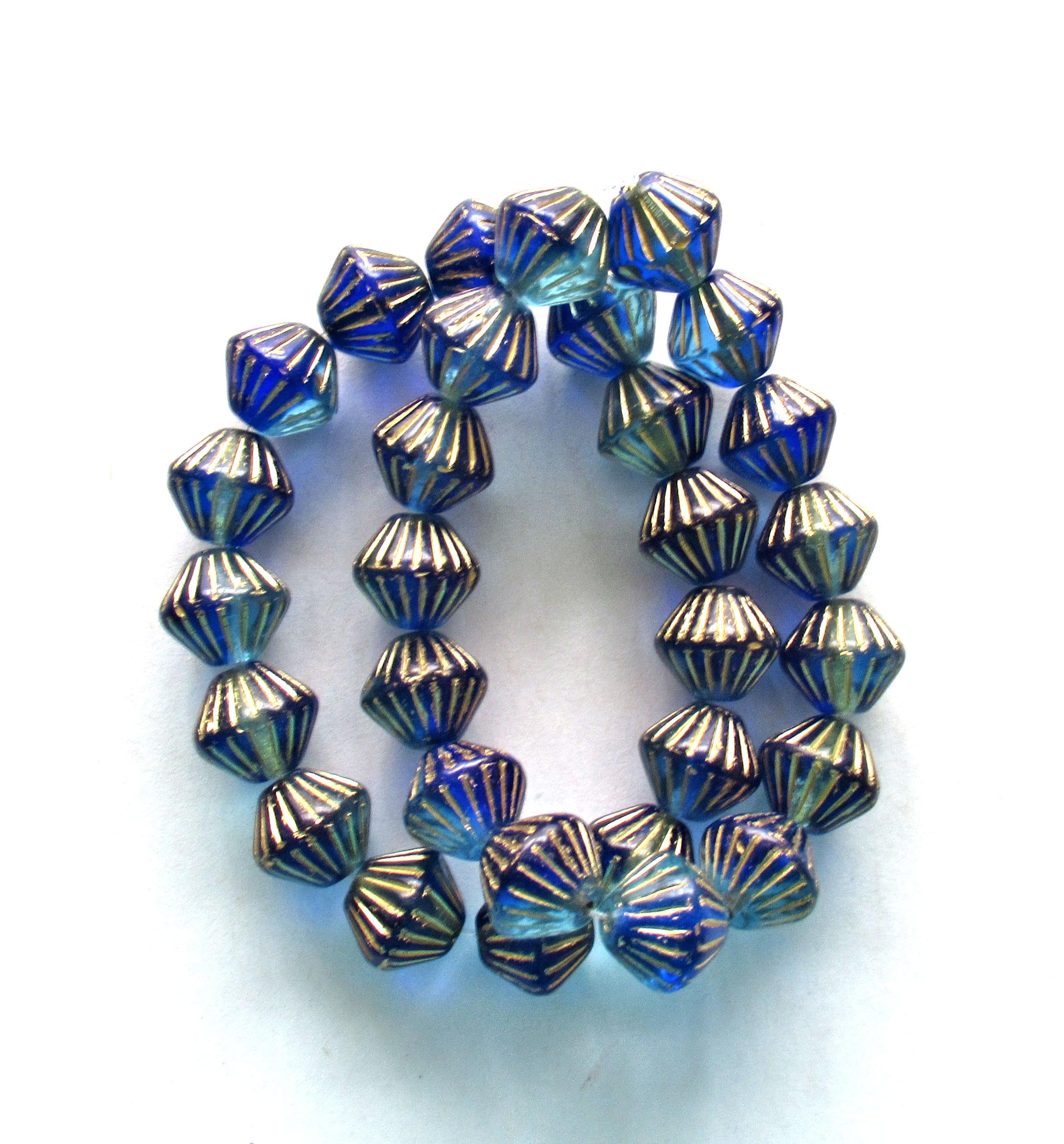 Five Czech glass bicones - 11mm x 10mm - sapphire & aqua blue mix with gold accents - carved chunky rustic bicone beads - C0057