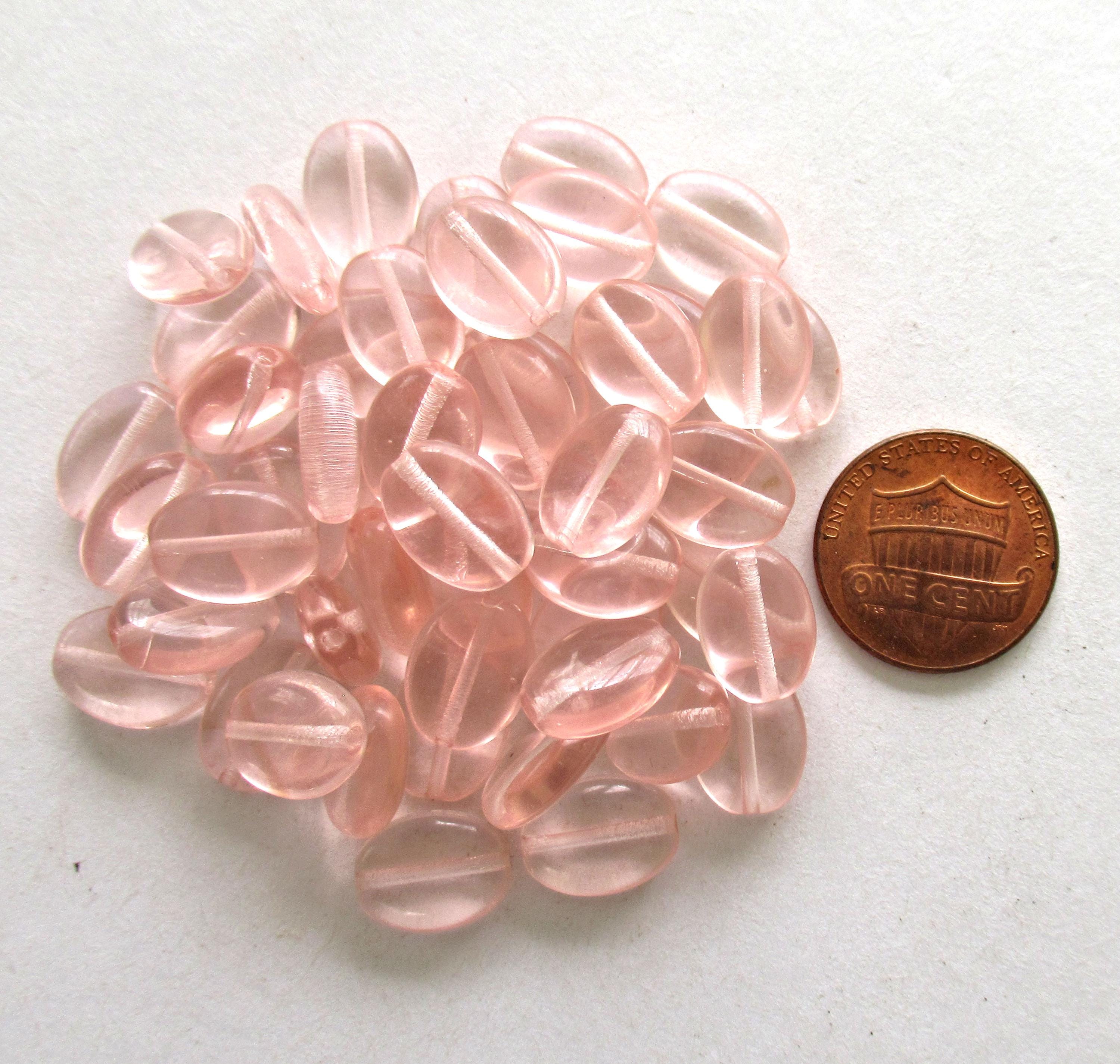 25 Czech glass flat oval beads - transparent pink - 12mm x 9mm - pressed glass beads C0046