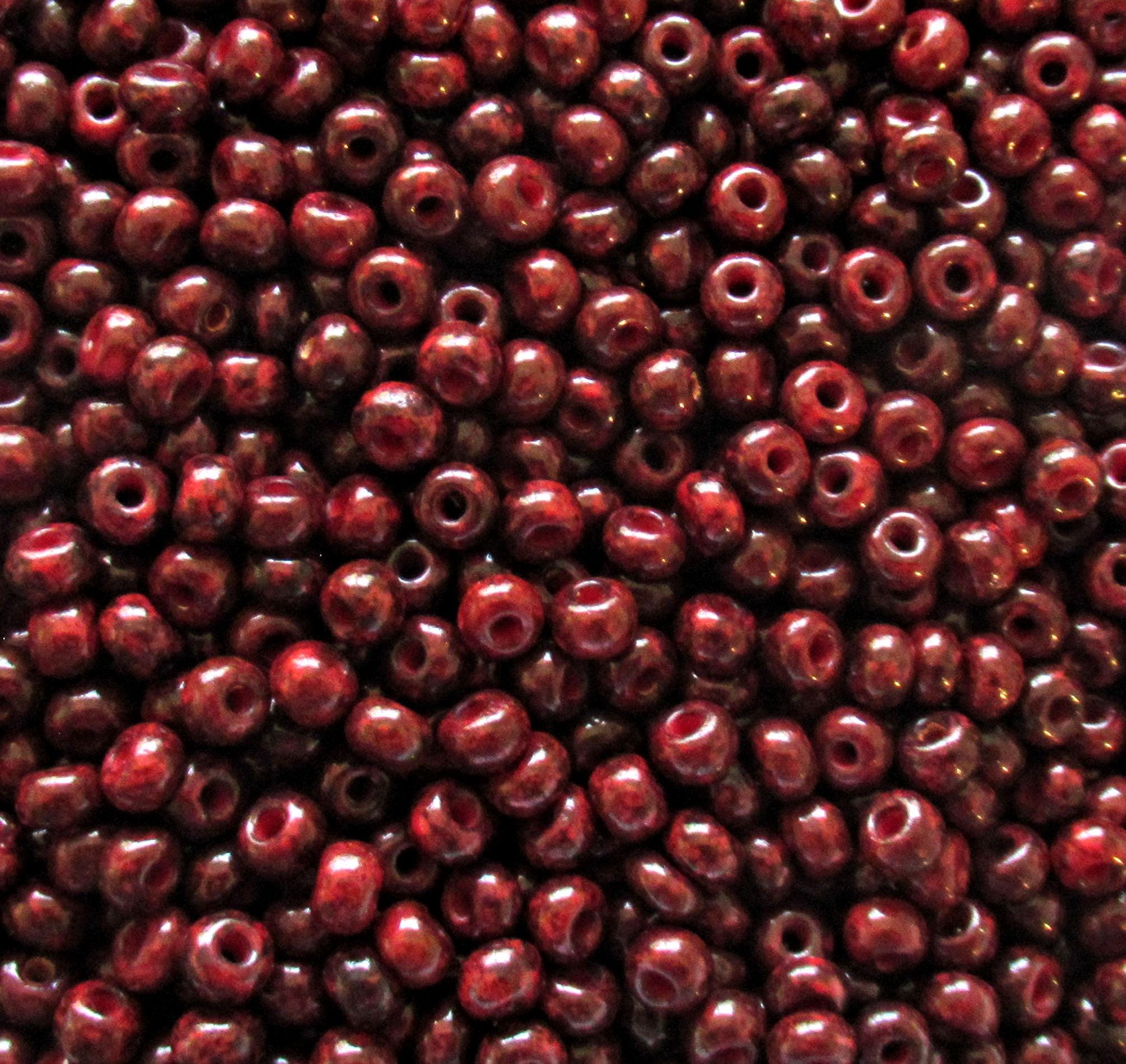 24 grams Czech 6/0 glass seed beads - size 6 - opaque dark red beads with a tavertine finish - Preciosa Rocaille 4mm spacer beads - C00111