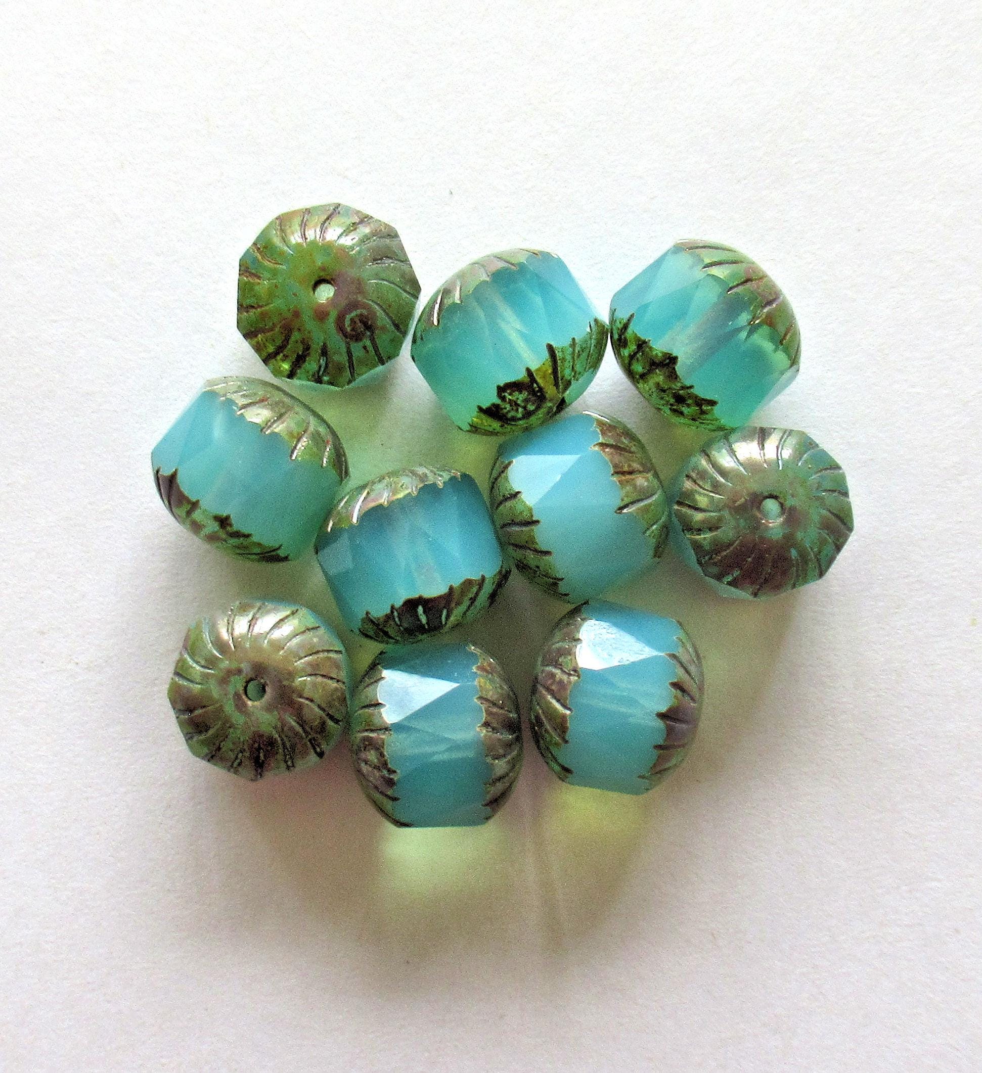 Ten Czech glass faceted carved cruller beads - 10mm - milky aqua blue opal Vaseline glass - cathedral beads w/ picasso accents - 00044