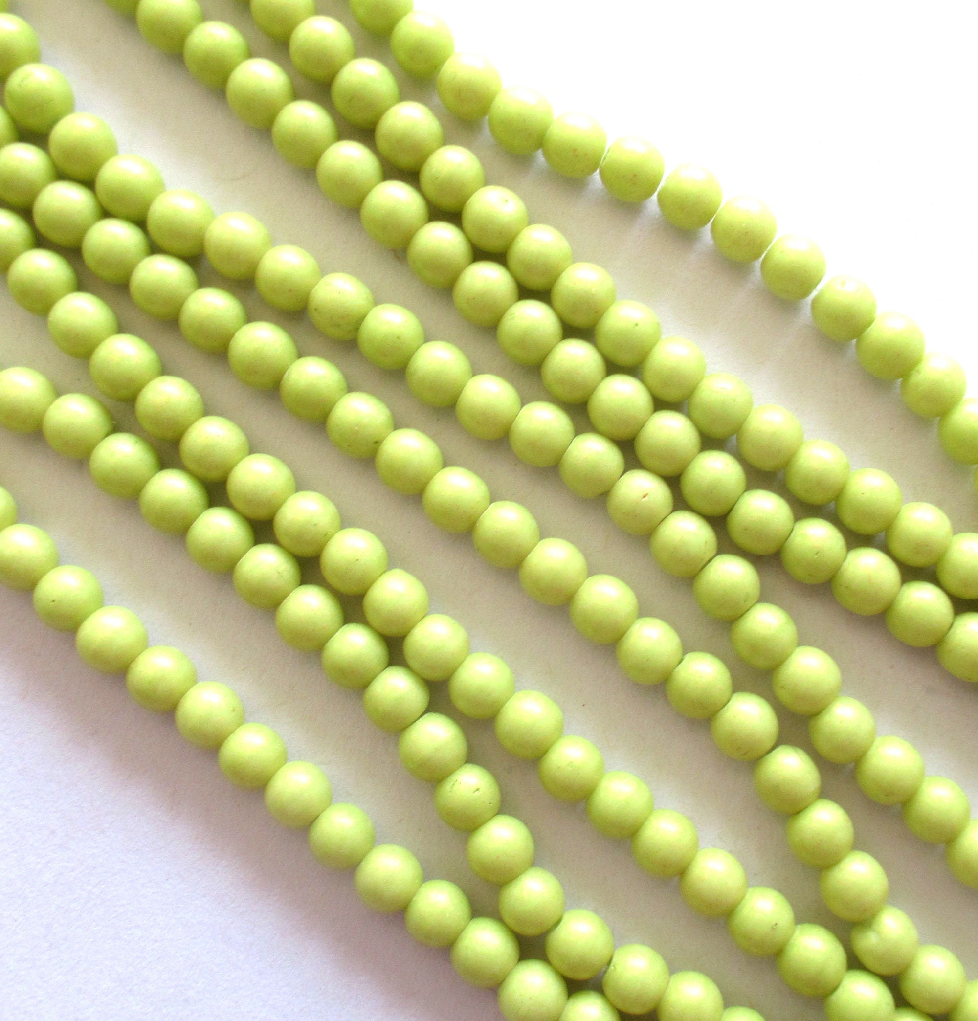 100 4mm Czech glass druk beads - Pacifica Honeydew - opaque light green smooth round druks - C0067