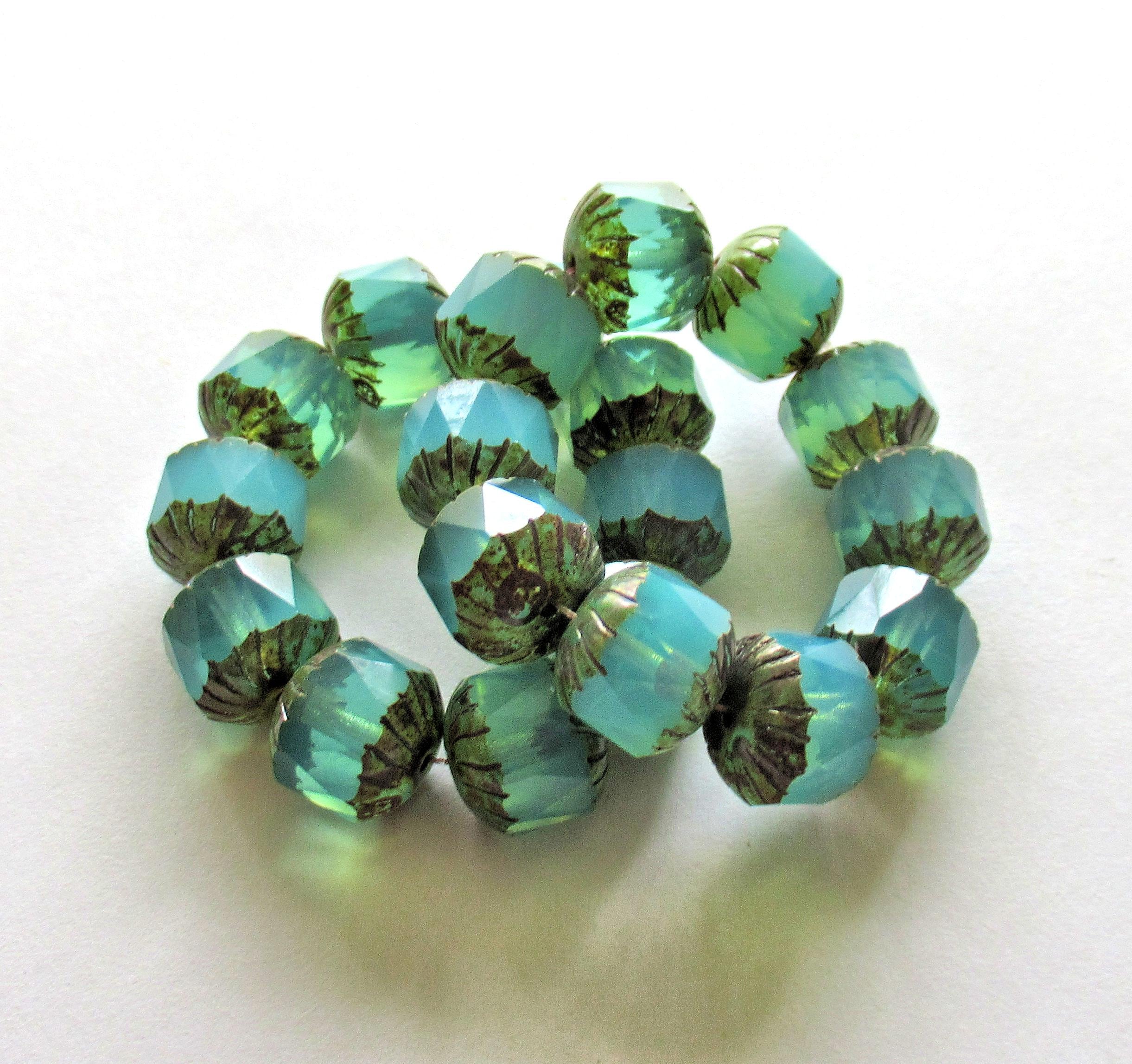 Ten Czech glass faceted carved cruller beads - 10mm - milky aqua blue opal Vaseline glass - cathedral beads w/ picasso accents - 00044