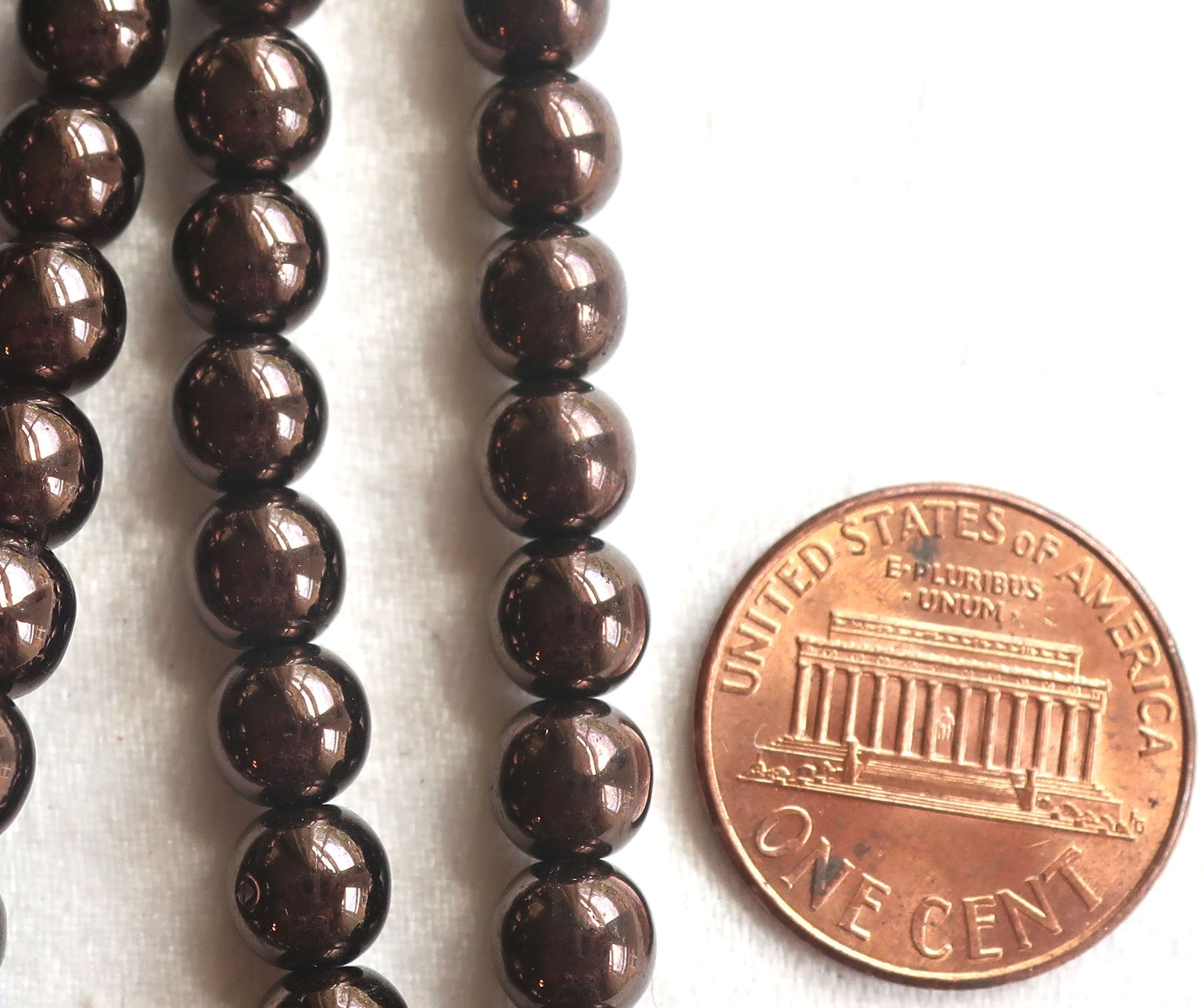 Lot of fifty 6mm Czech glass druks, Metallic Dark Chocolate Bronze smooth round Czech glass druk beads C92101 - Glorious Glass Beads