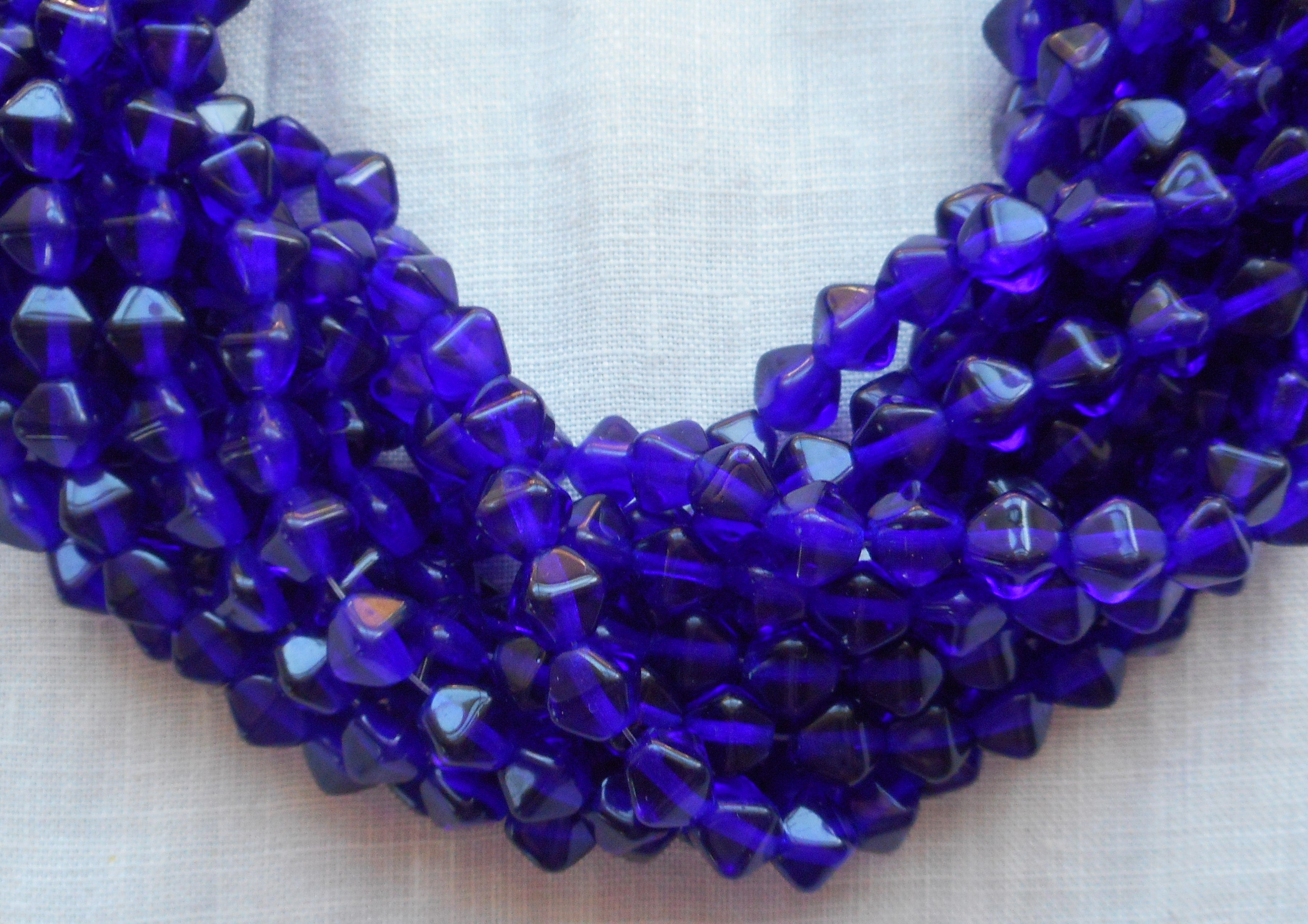 Fifty 6mm Cobalt Blue bicone pressed glass Czech beads, C0093