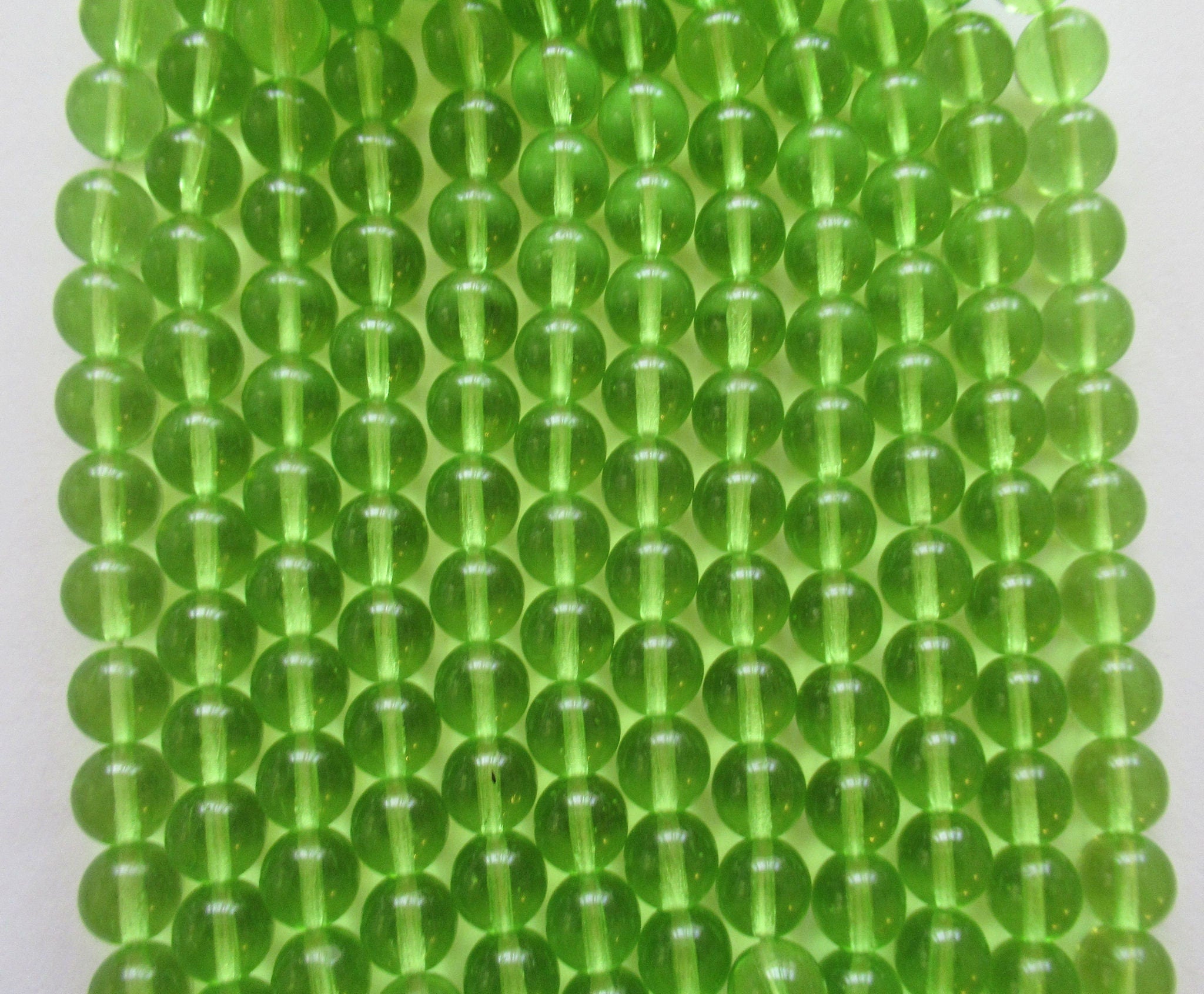 Lot of 25 8mm Czech glass druks - peridot green smooth round druk beads C0014