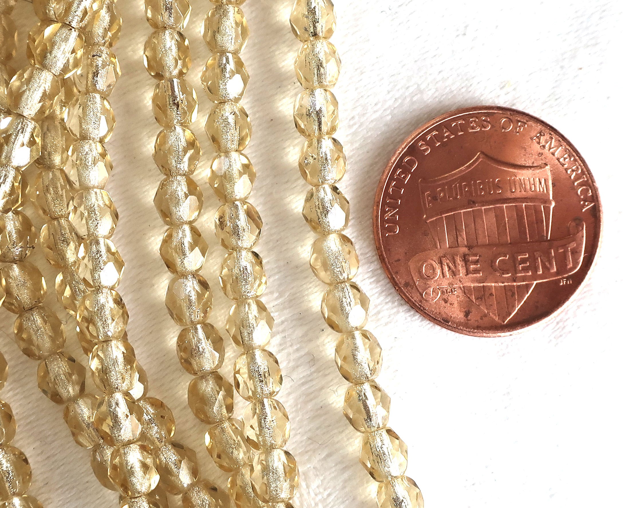 Lot of 50 4mm Light Topaz Czech glass beads, silver lined faceted round firepolished beads C5501 - Glorious Glass Beads