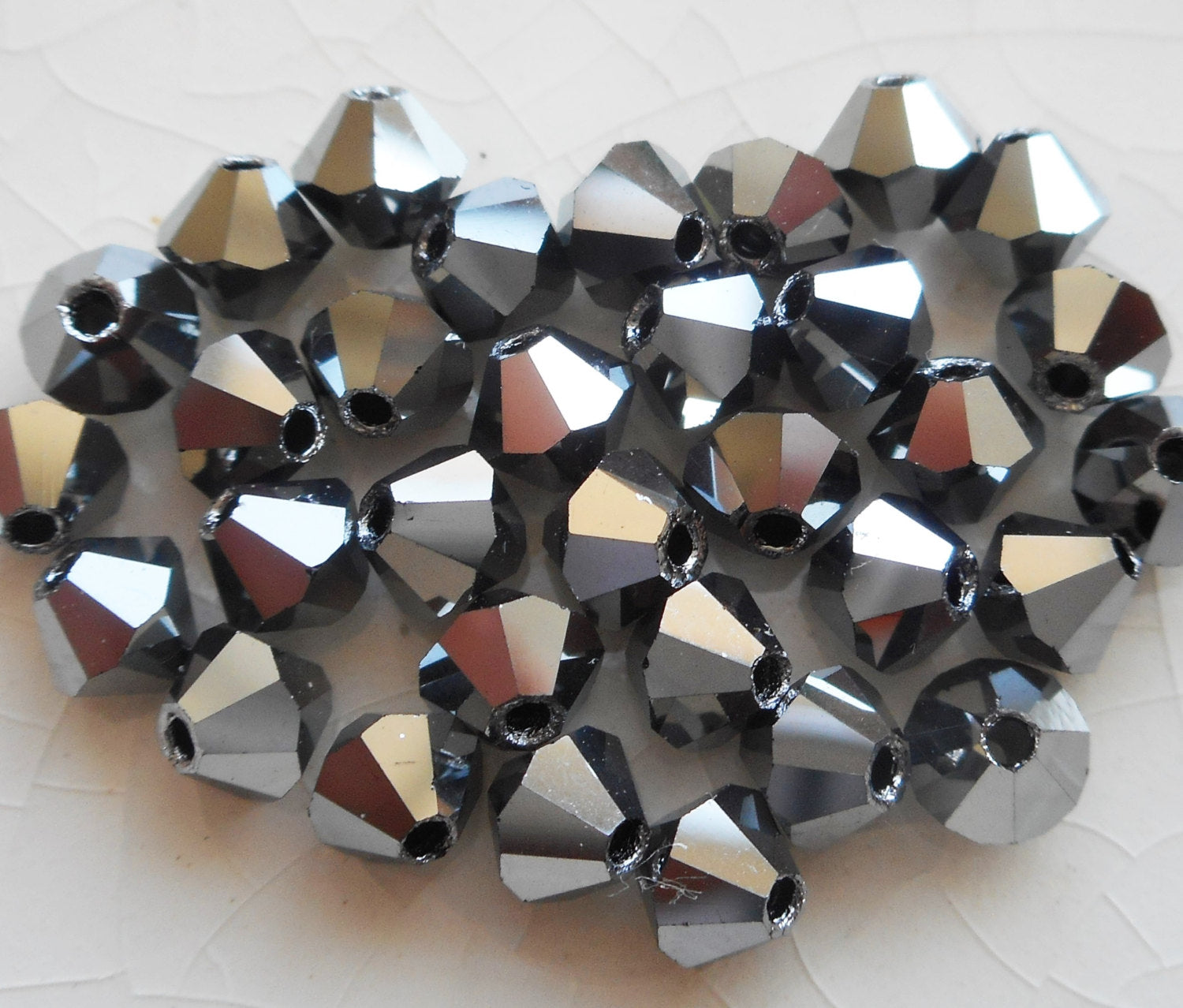 Lot of 24 4mm Czech opaque Hematite glass faceted bicone beads, Preciosa Crystal silver bicones 7401 - Glorious Glass Beads
